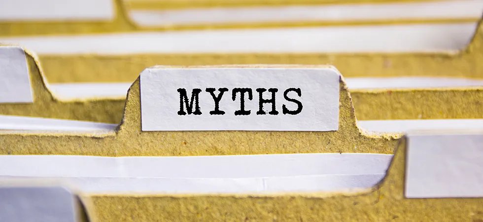 Close up photograph of file folders with Myths printed on one of the tabs