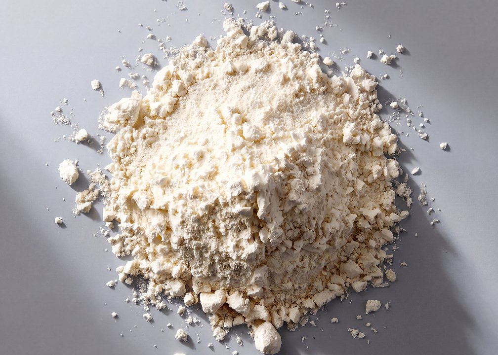 Fine VERISOL® collagen peptide powder shown in close-up, representing a clinically studied ingredient in Metagenics® StayStrong™ collagen supplements for skin health.