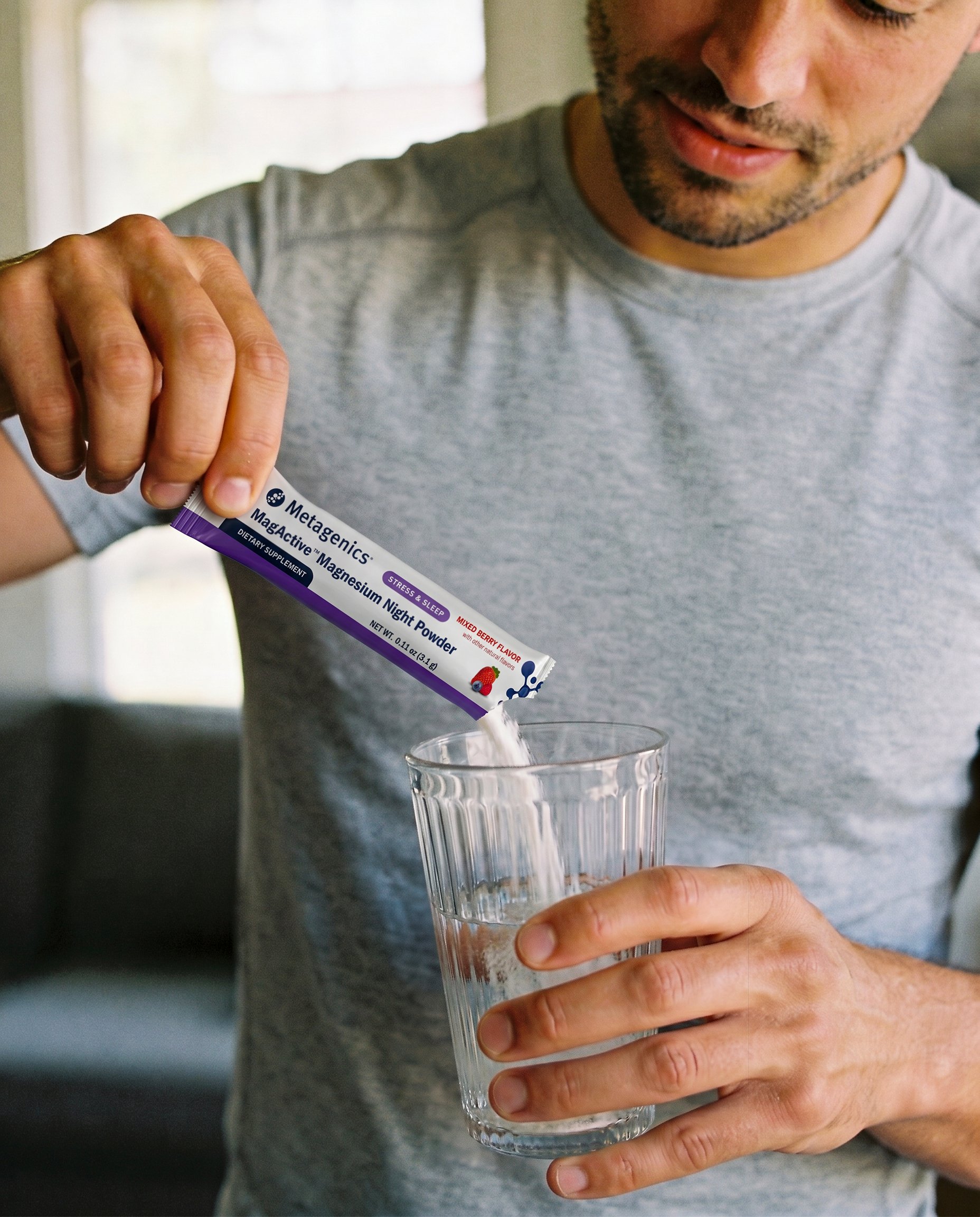 magactive magnesium night powder being poured into water