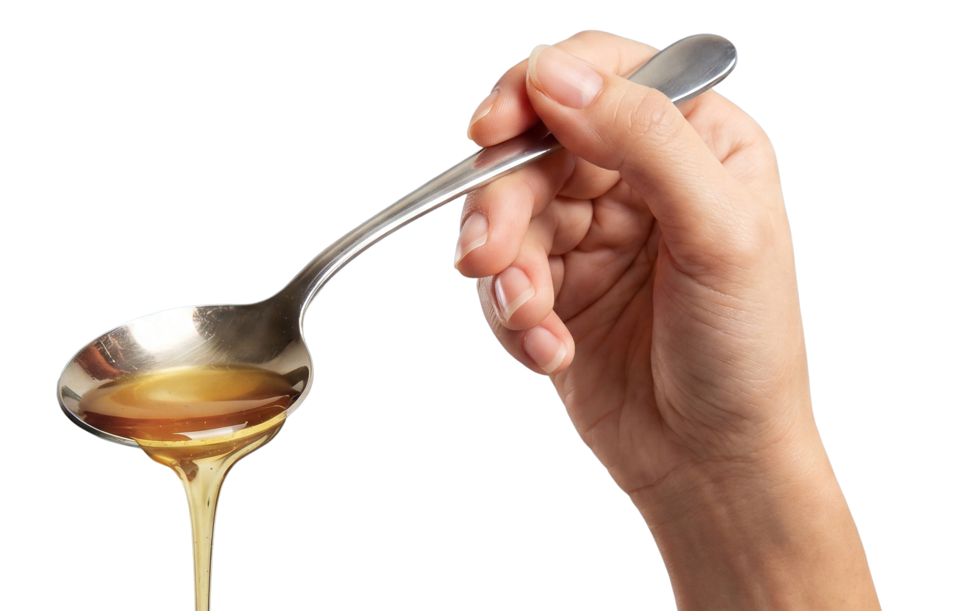 A hand holding a spoon filled with golden fish oil liquid 
