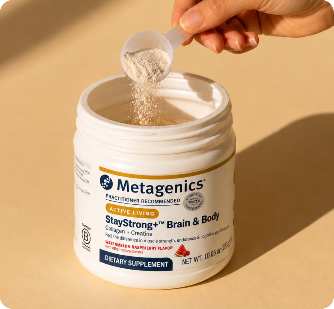 Container of Metagenics StayStrong+ Brain & Body powder with a scoop as part of a daily Fall Wellness routine for seasonal self-care.