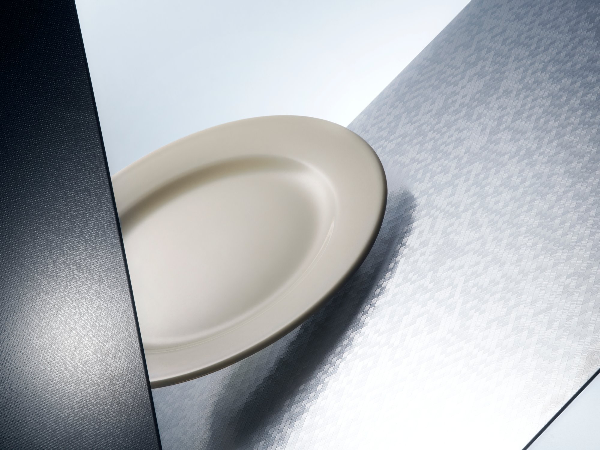 Stain-resilient stainless steel surface used in an architectural interior application