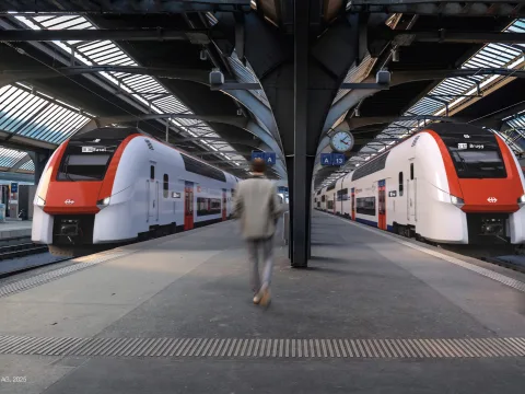 Weisser Zug mit roter Front am Hauptbahnhof Zürich
