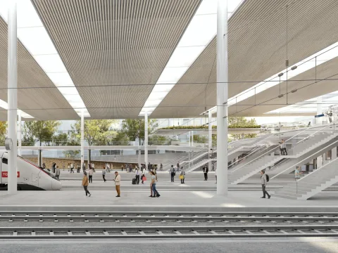 Der künftige Westteil des Bahnhofs Basel SBB mit Perron, Gleisen und Perrondach. Menschen gehen oder warten auf ihre Züge, während ein roter Zug am linken Rand des Bildes steht. Rechts sind die Aufgänge des Perronzugangs Margarethen zu sehen.