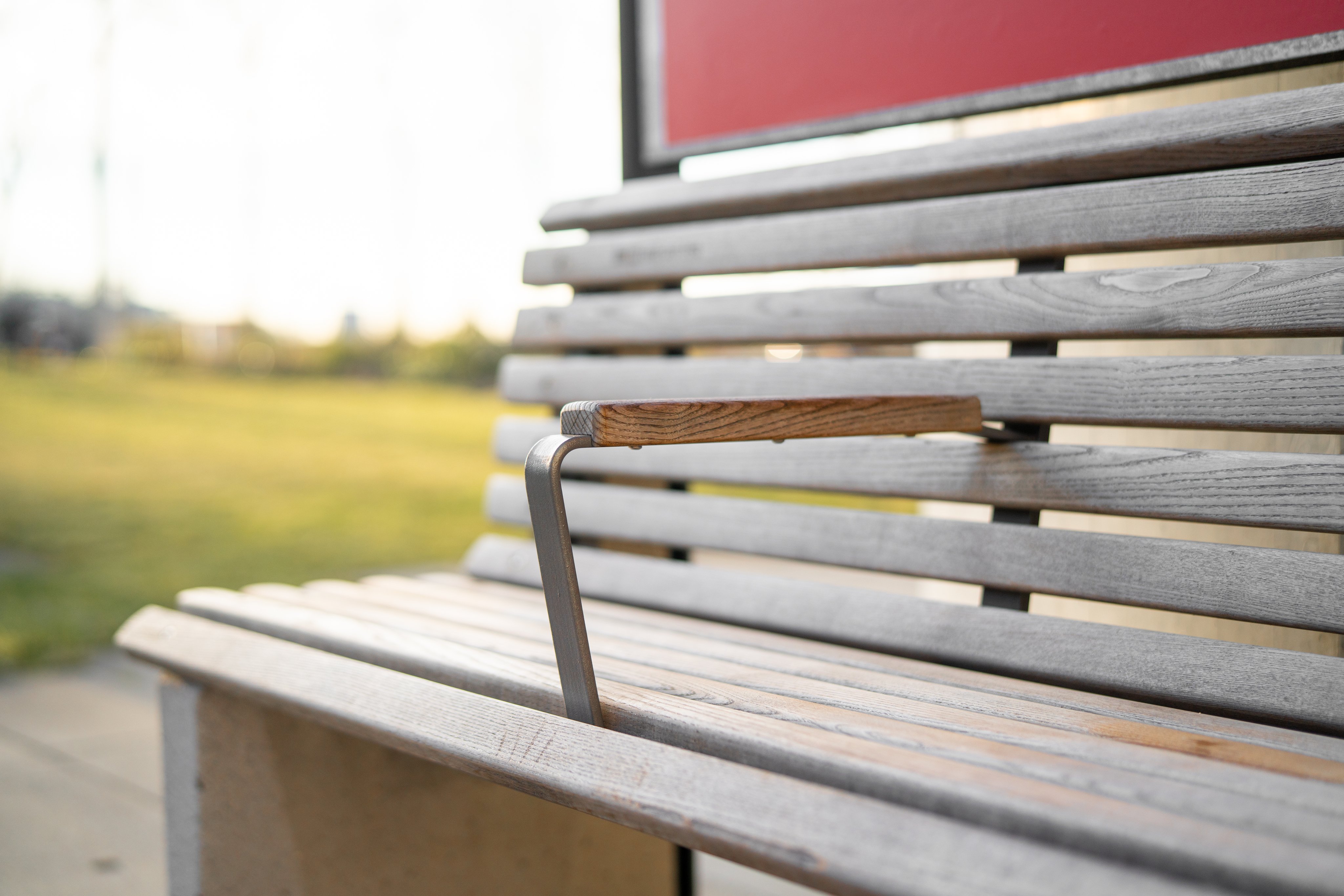 The redesigned wooden bench, taken in a small park.