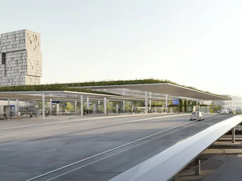 Die Margarethenbrücke und die künftige Tramhaltestelle auf der Margarethenbrücke mit begrüntem Dach. Im Hintergrund ist ein großes, würfelförmiges Gebäude zu sehen, das Meret Oppenheim-Hochhaus.