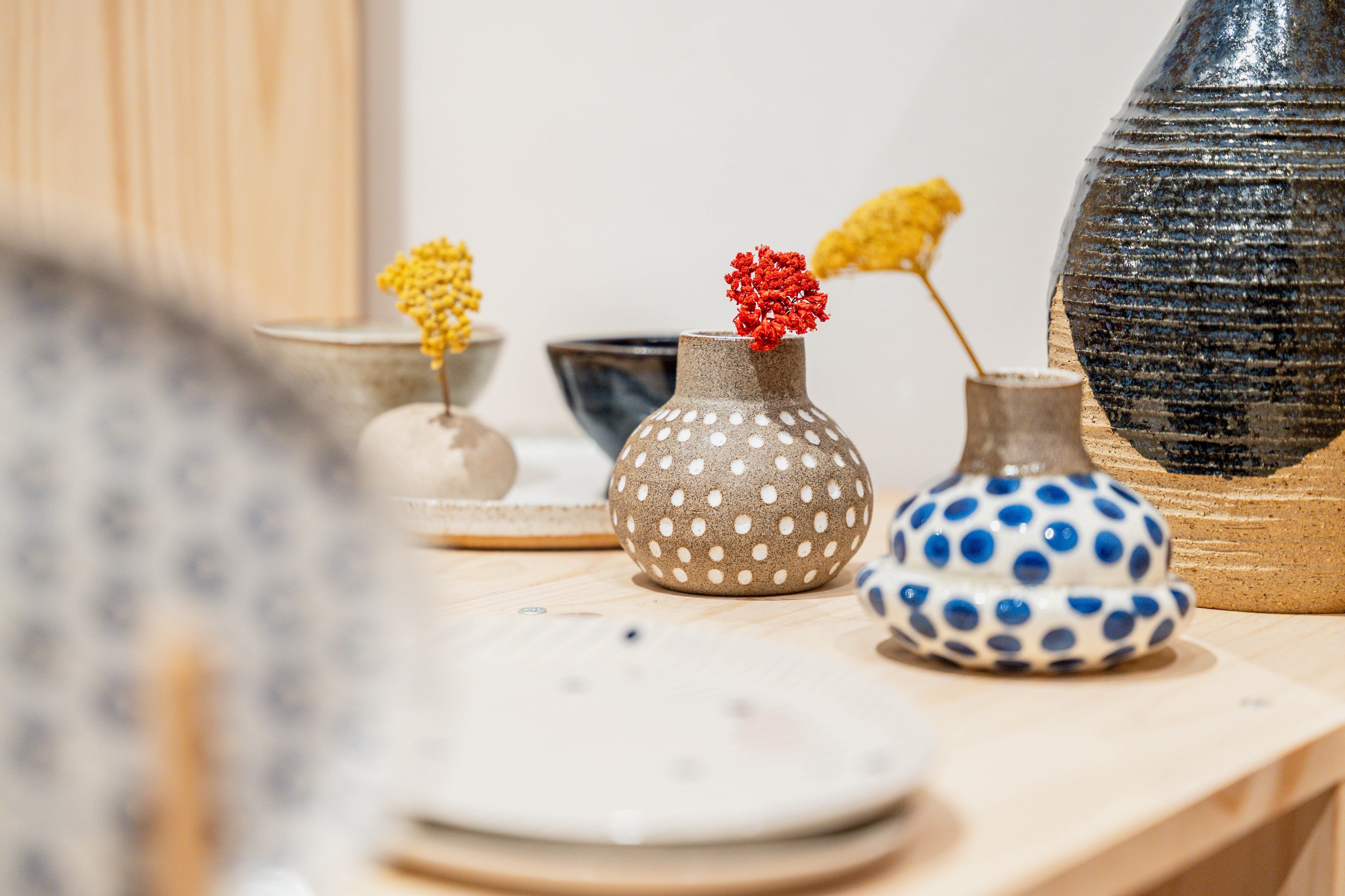 Colourful ceramic objects in different sizes