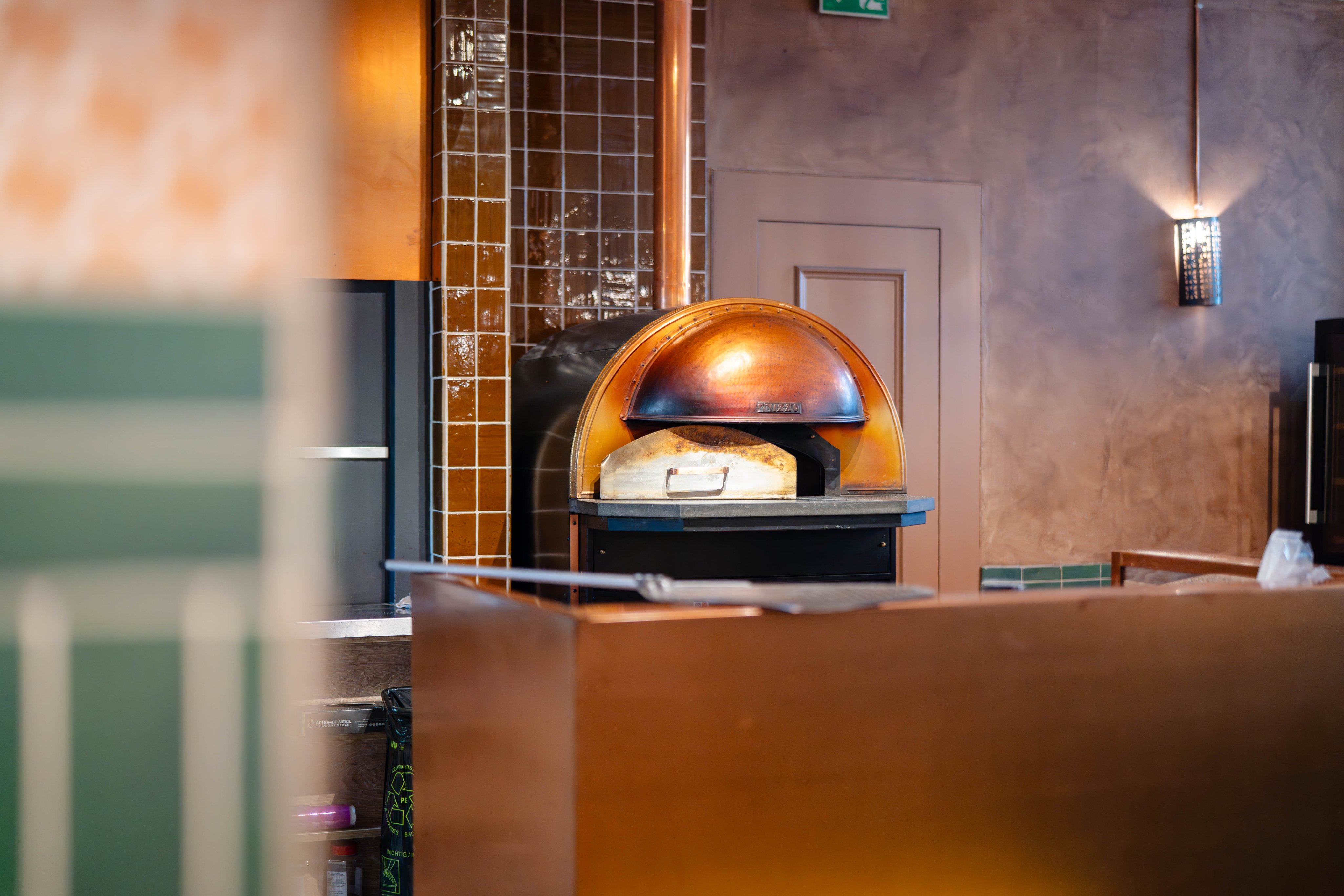 Stove behind the bar.