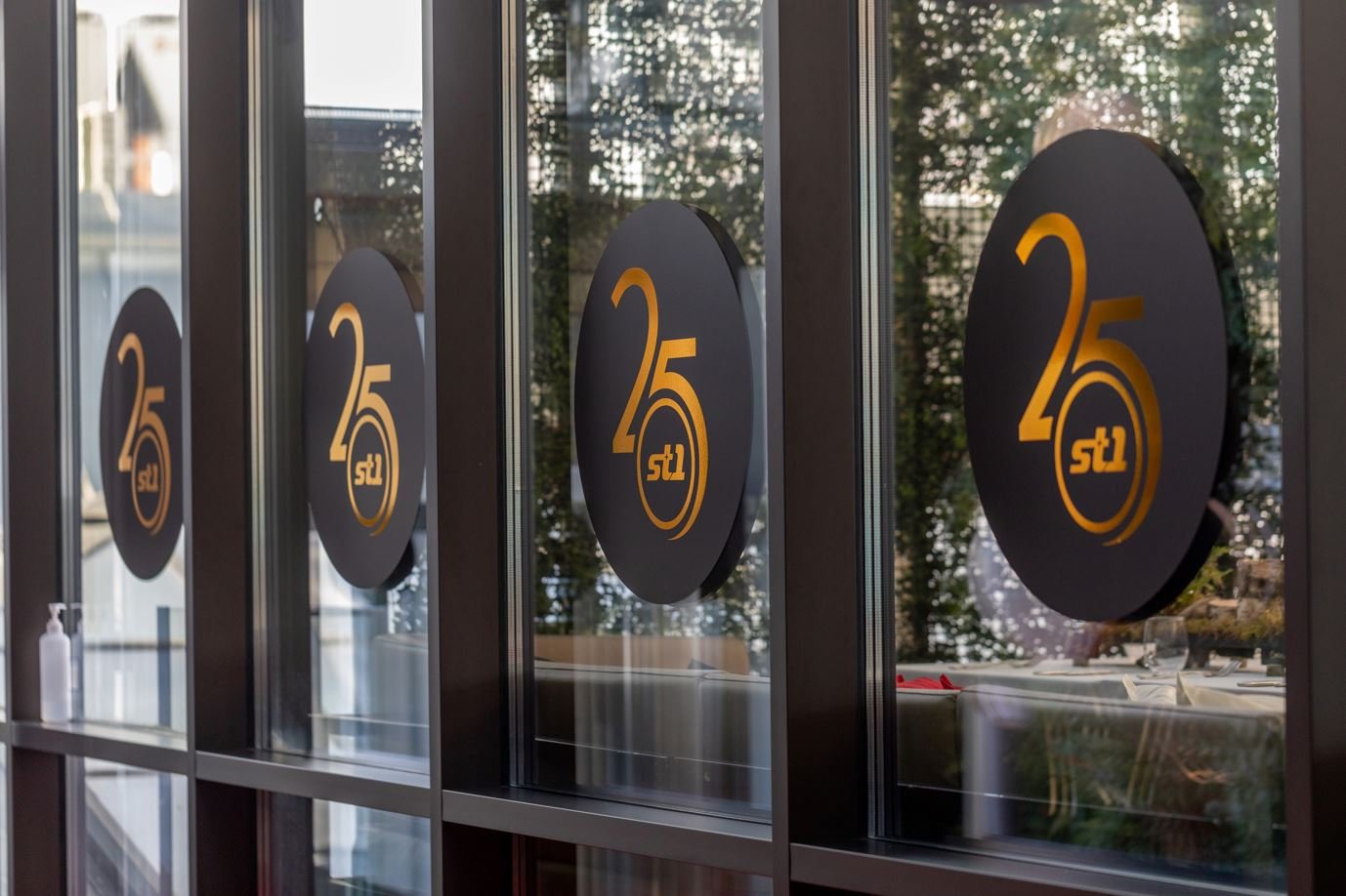 25th anniversary decorations on glass windows