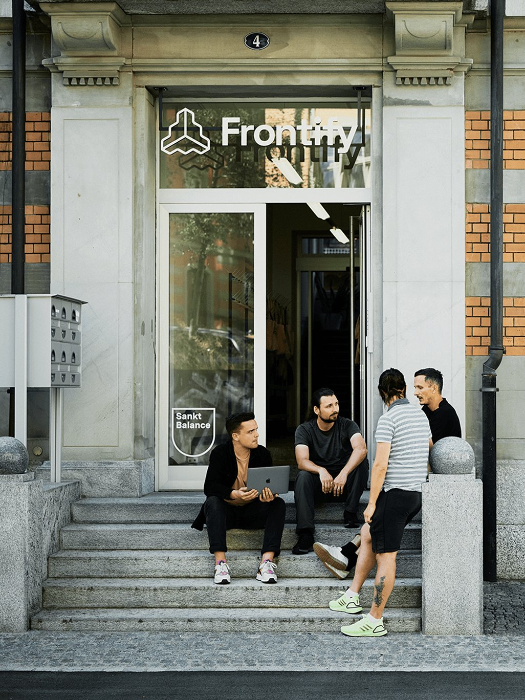 A carousel of images of Frontfiy employees