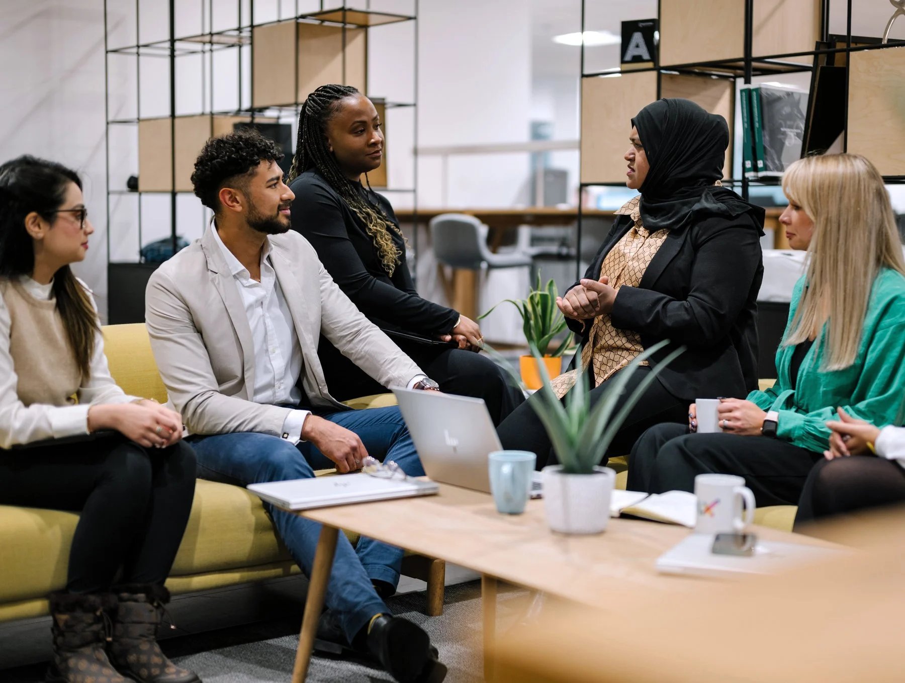 A carousel of images of Frontfiy employees