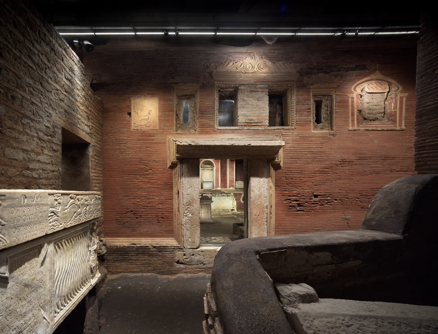 Vatican Necropolis, A view into the mausoleum from the ancient road: the light reveals the relationship between the former interior and the exterior space, which was once open to the sky.