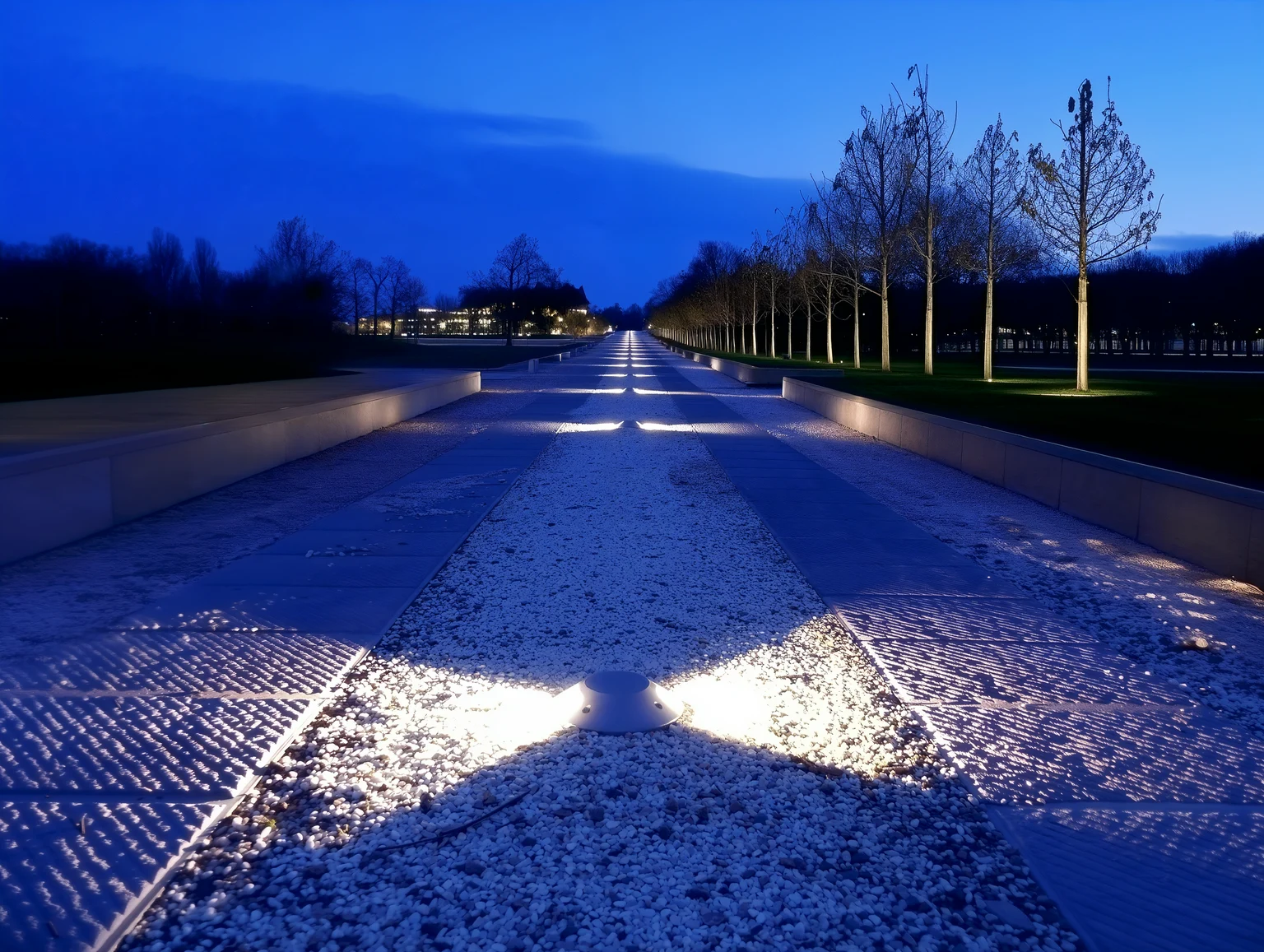 Cesar Edge surface-mounted luminaire installed on a path