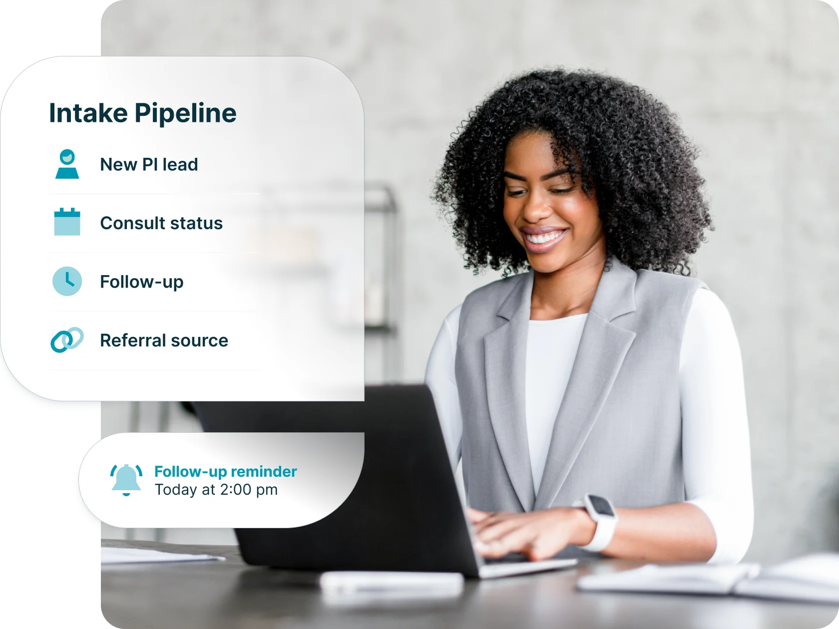 Personal injury lawyer working on a laptop, with intake feature highlight