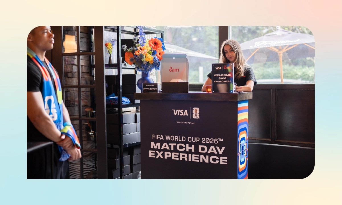 Guests check in at the Visa-branded FIFA World Cup 2026 Match Day Experience welcome desk before the pre-match reception.