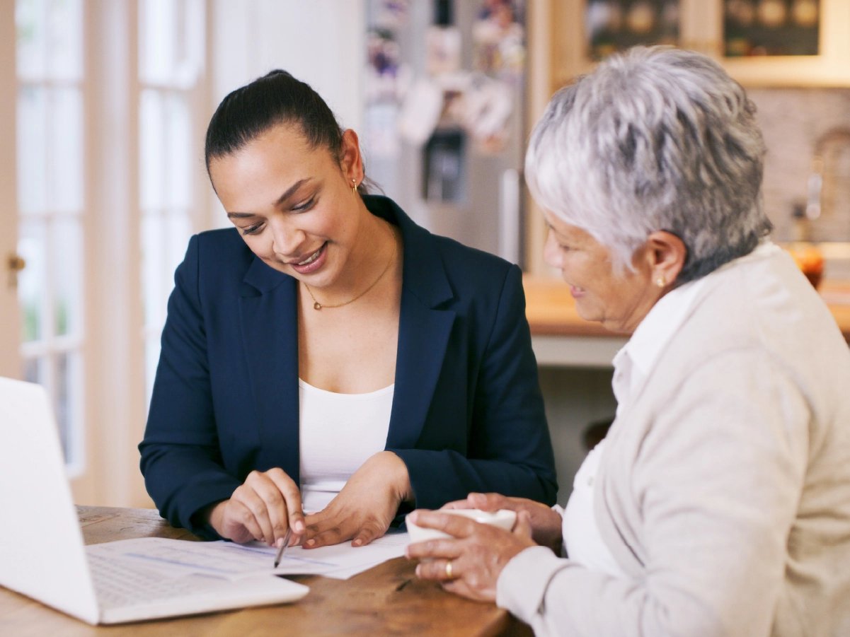 Estate planning attorney reviewing documents with a client