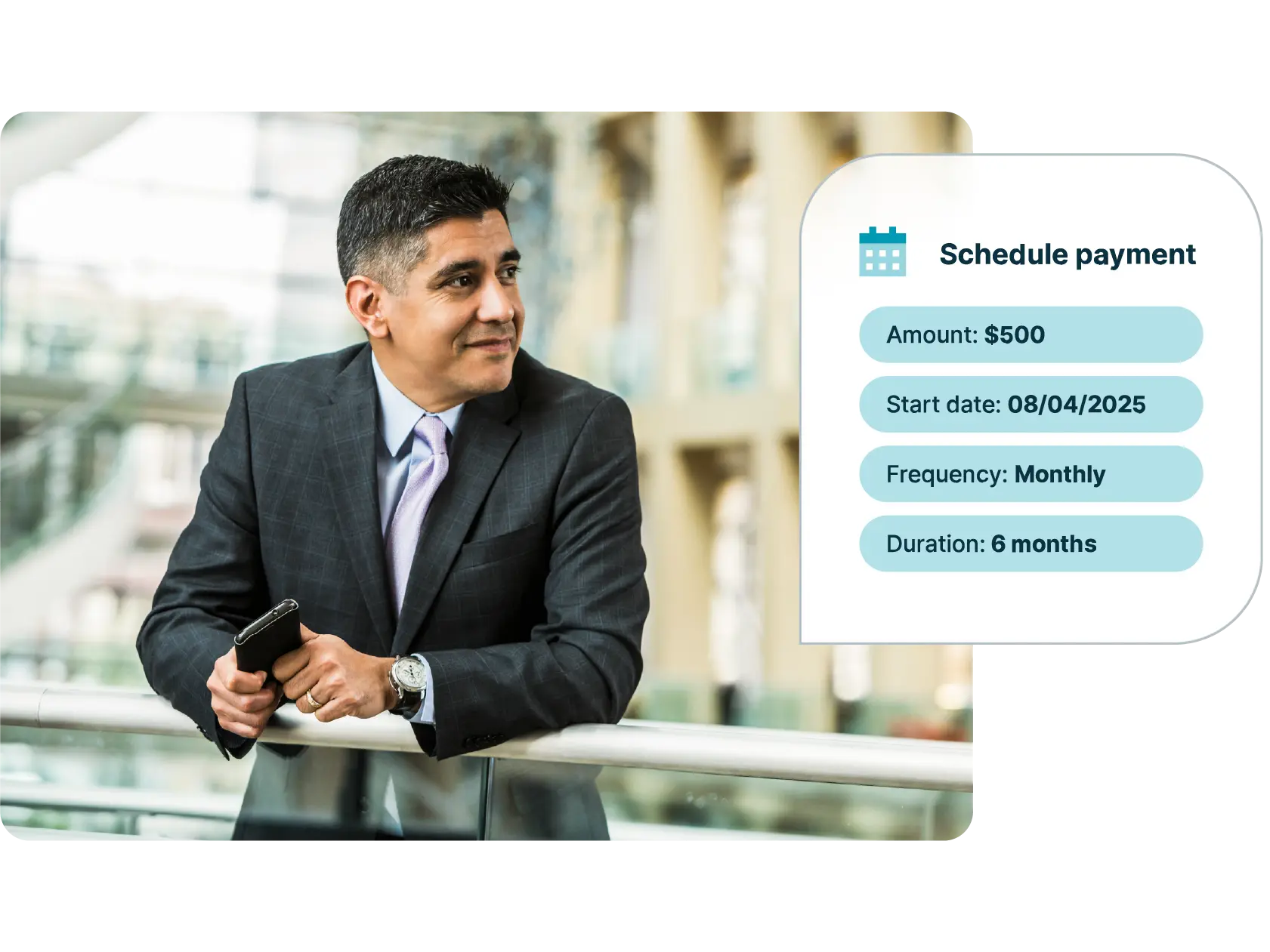 A man schedule payments on his phone
