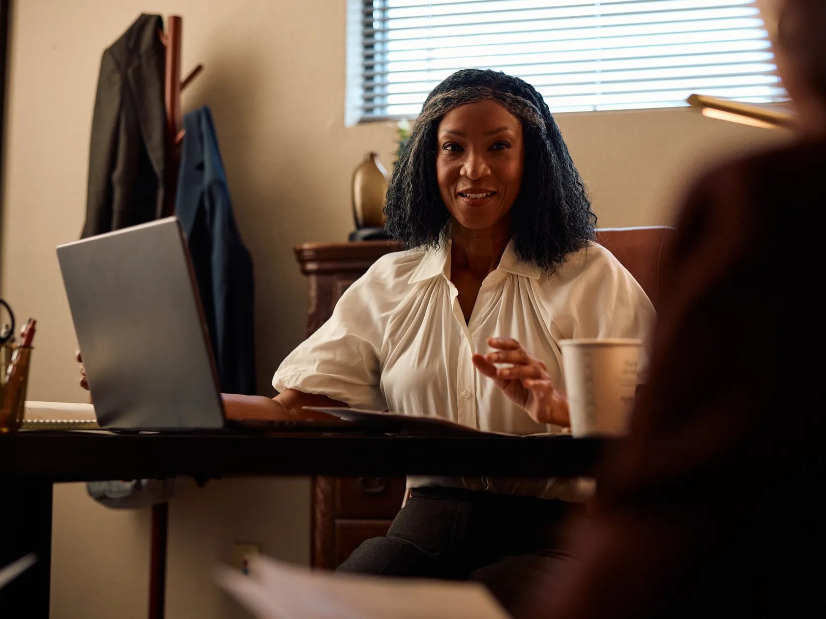 Insurance defense lawyer smiling
