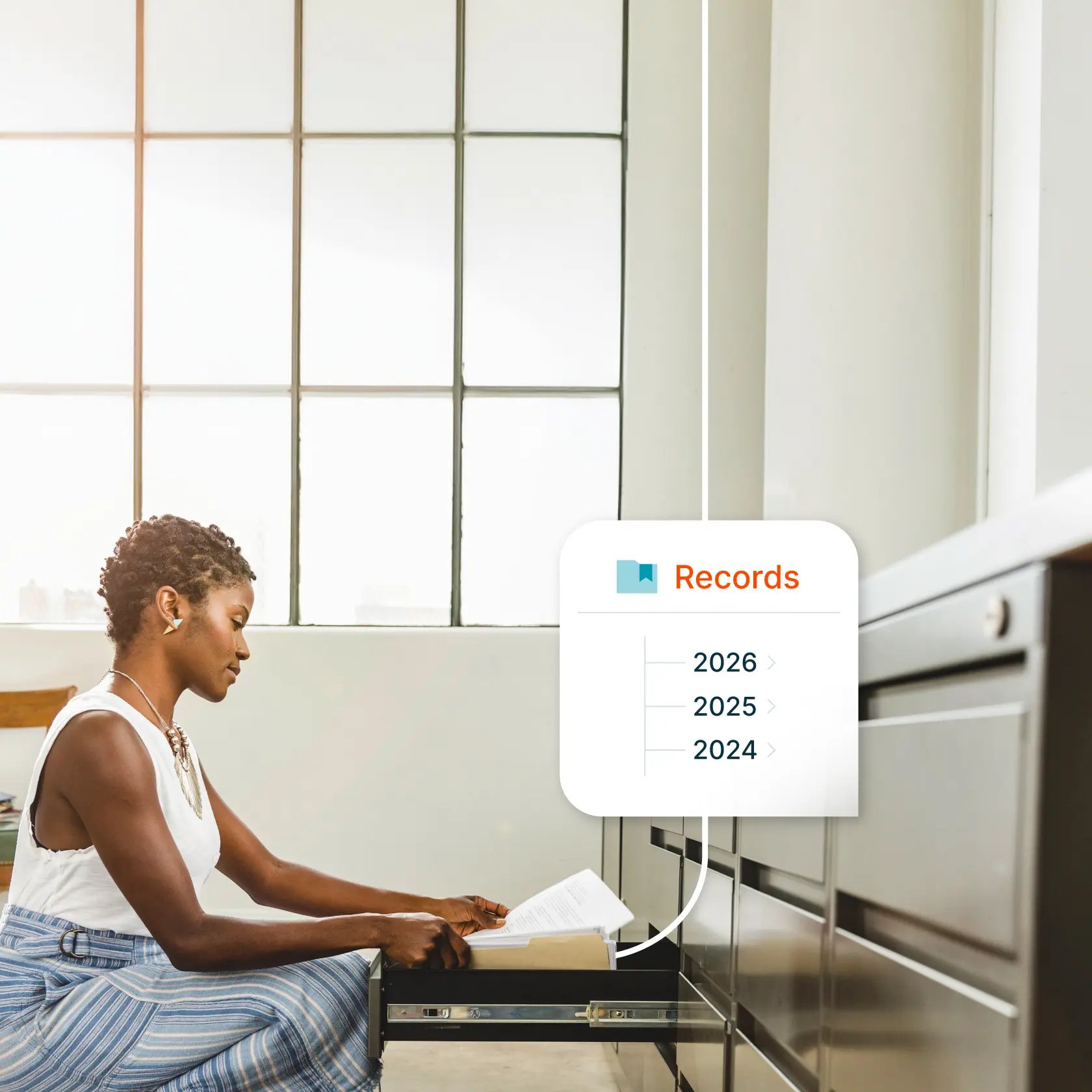 Lawyer organizing financial records in filing cabinet