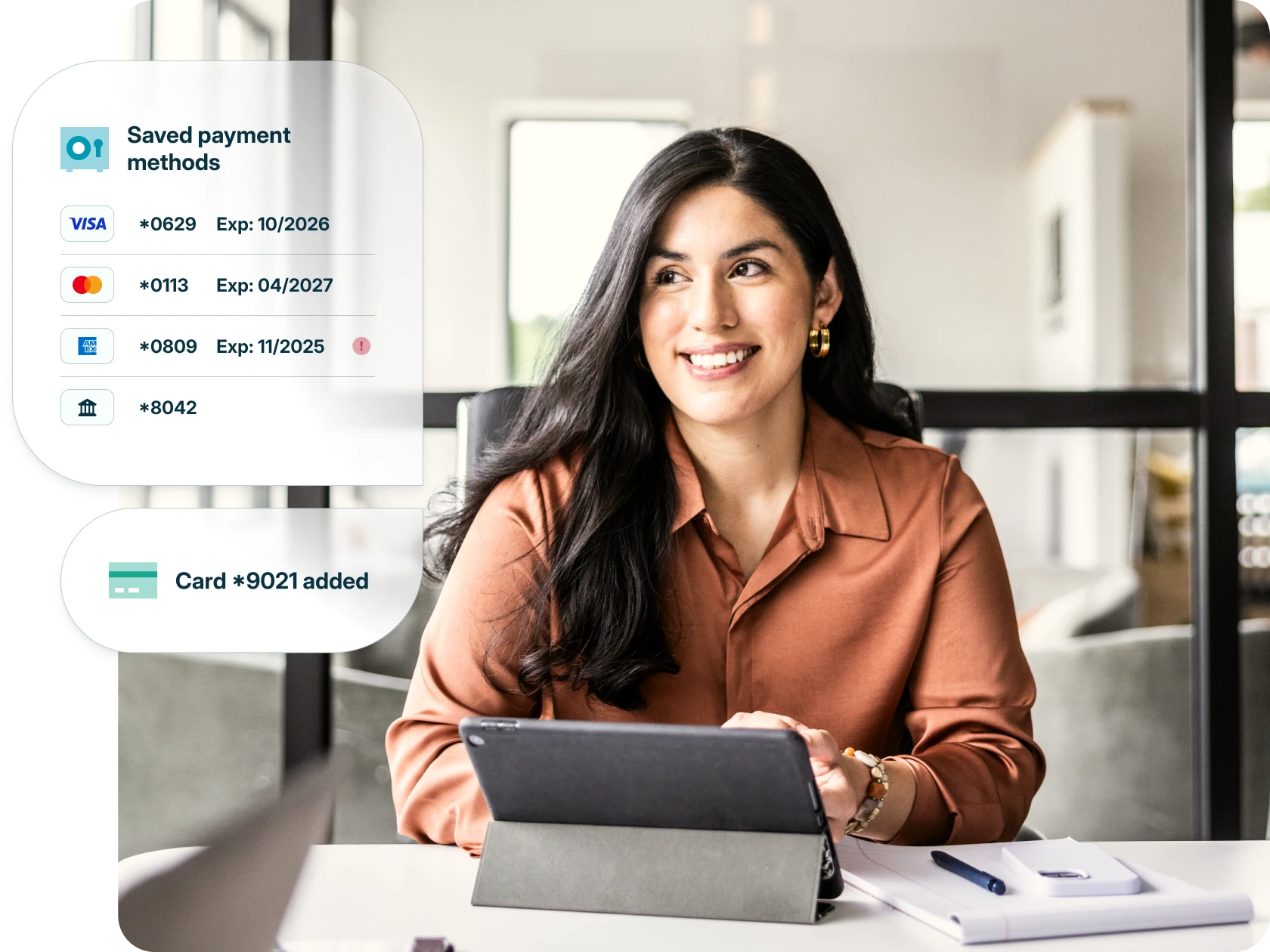 Person working on their computer with a feature highlight for CPACharge Card Vault.
