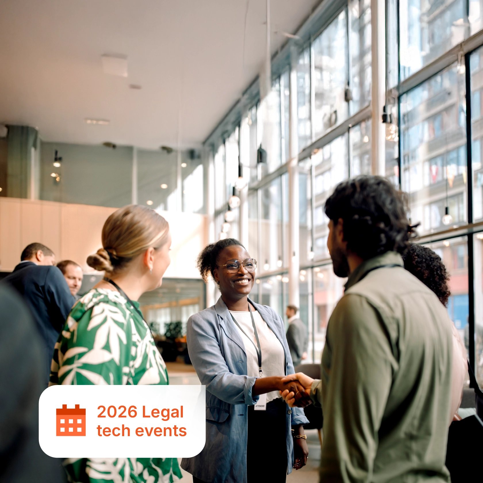 A group of legal professionals networking and shaking hands at a modern, sunlit conference venue. An icon with the text “2026 Legal tech events” appears in the lower left corner.