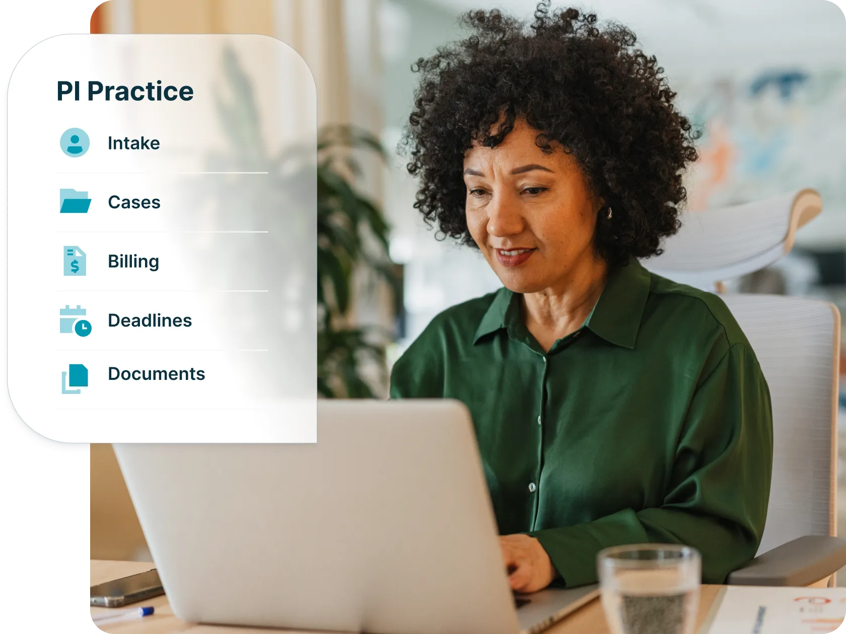 Personal injury lawyer working on a laptop, with practice management feature highlight
