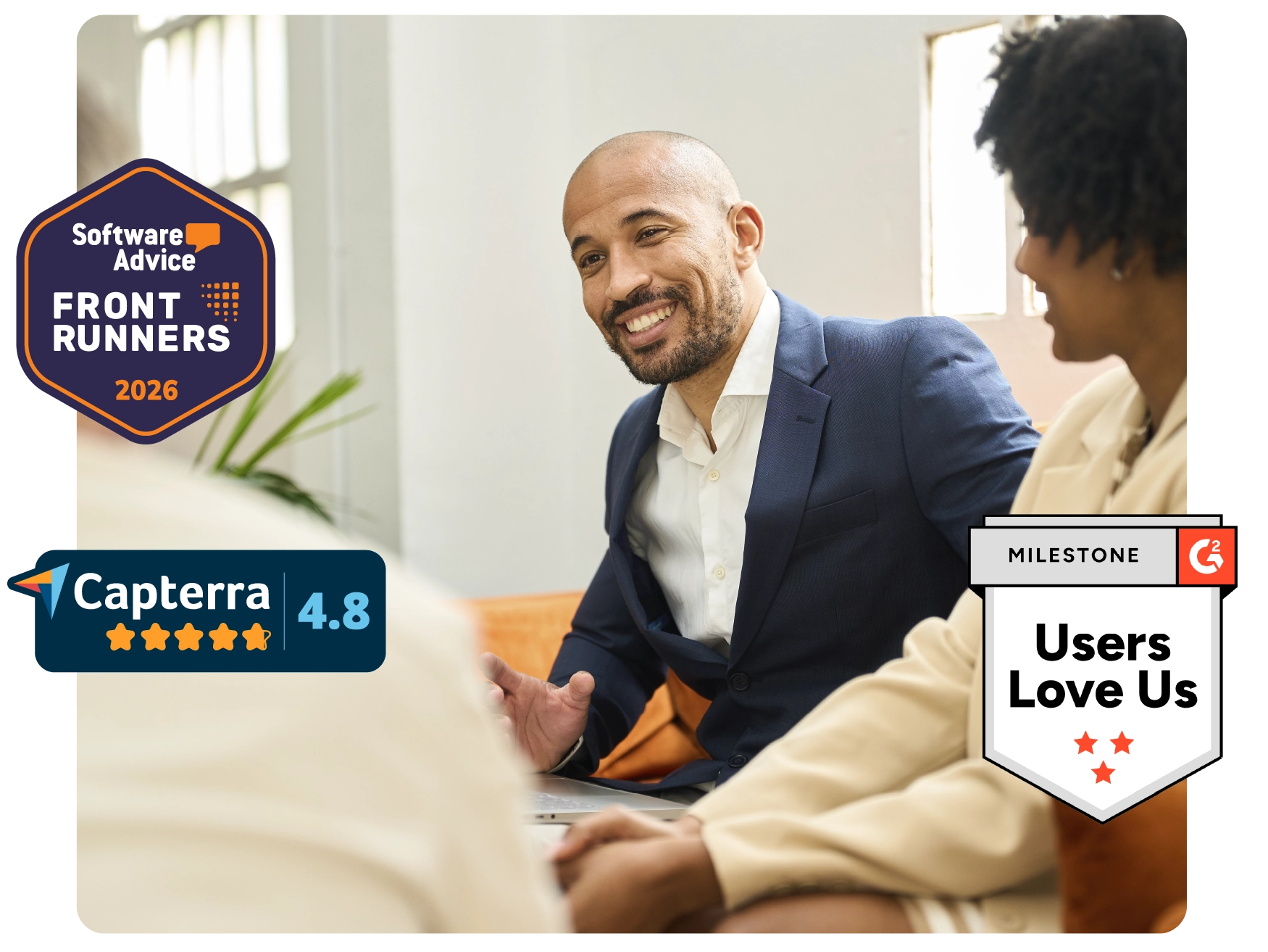 Business professionals collaborating in office with Software Advice FrontRunners 2026, Capterra 4.8 rating, and G2 Users Love Us badges.