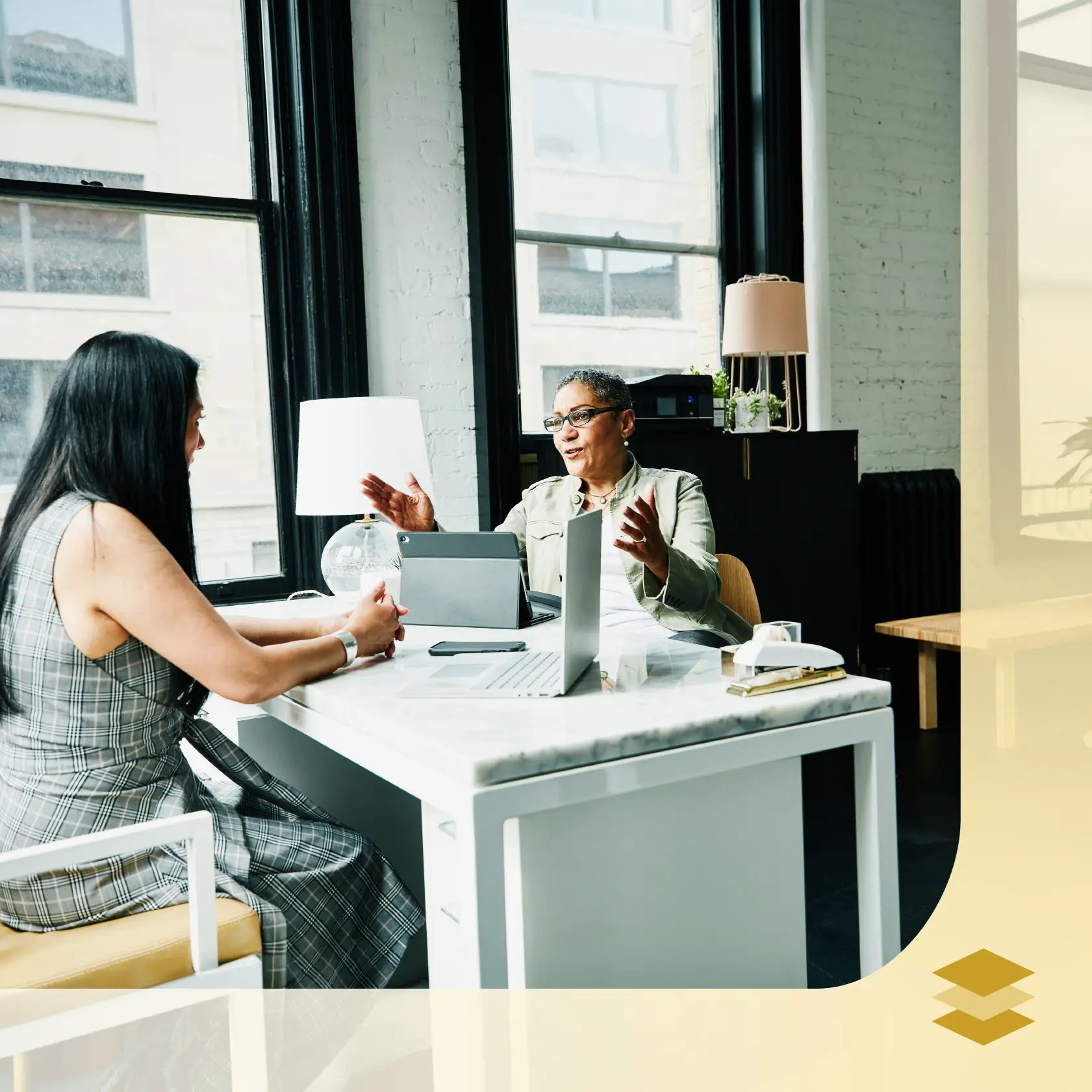 Two accountants having a conversation about firm technology 