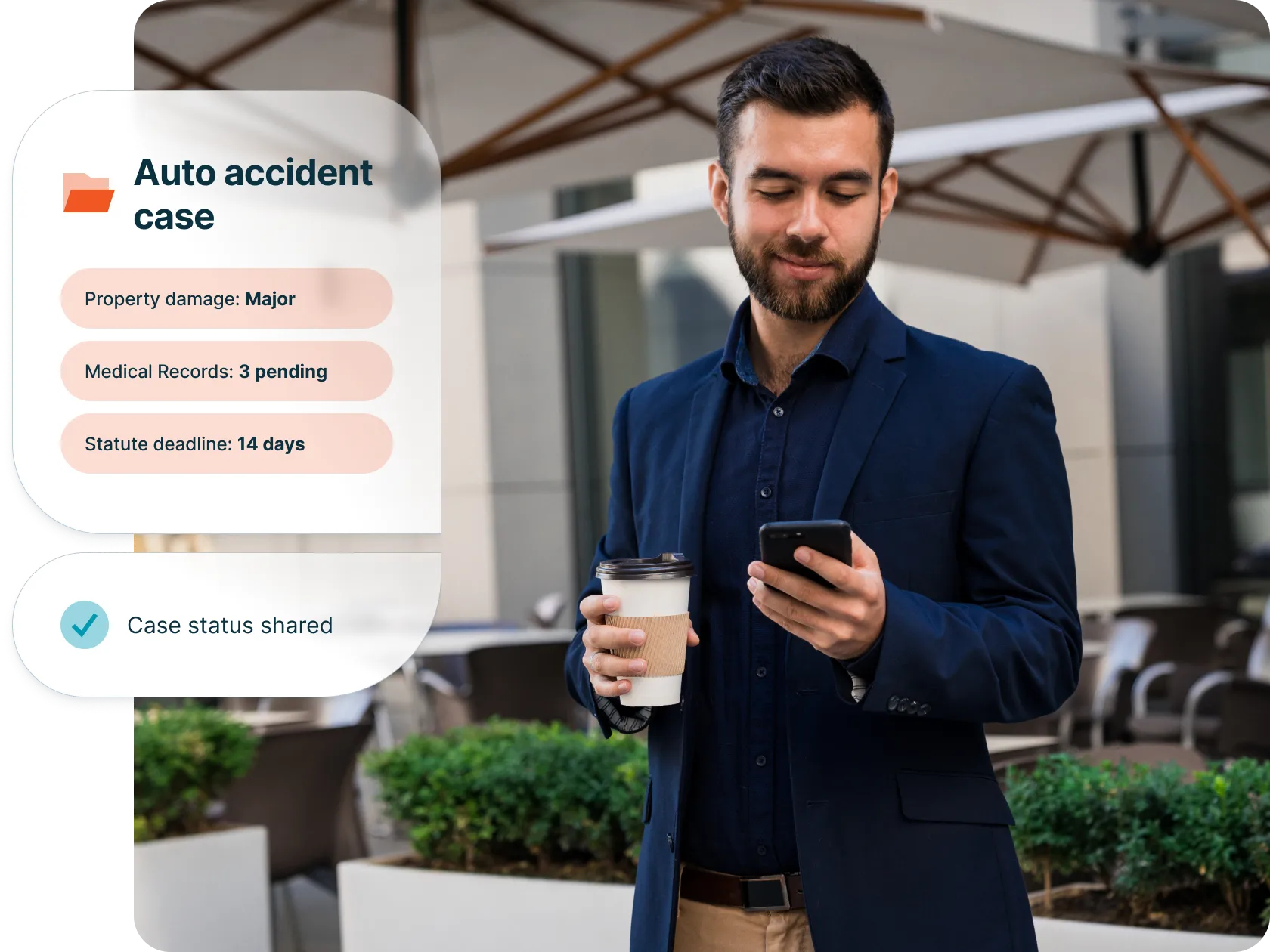  Personal injury lawyer checking phone, with case management feature highlight