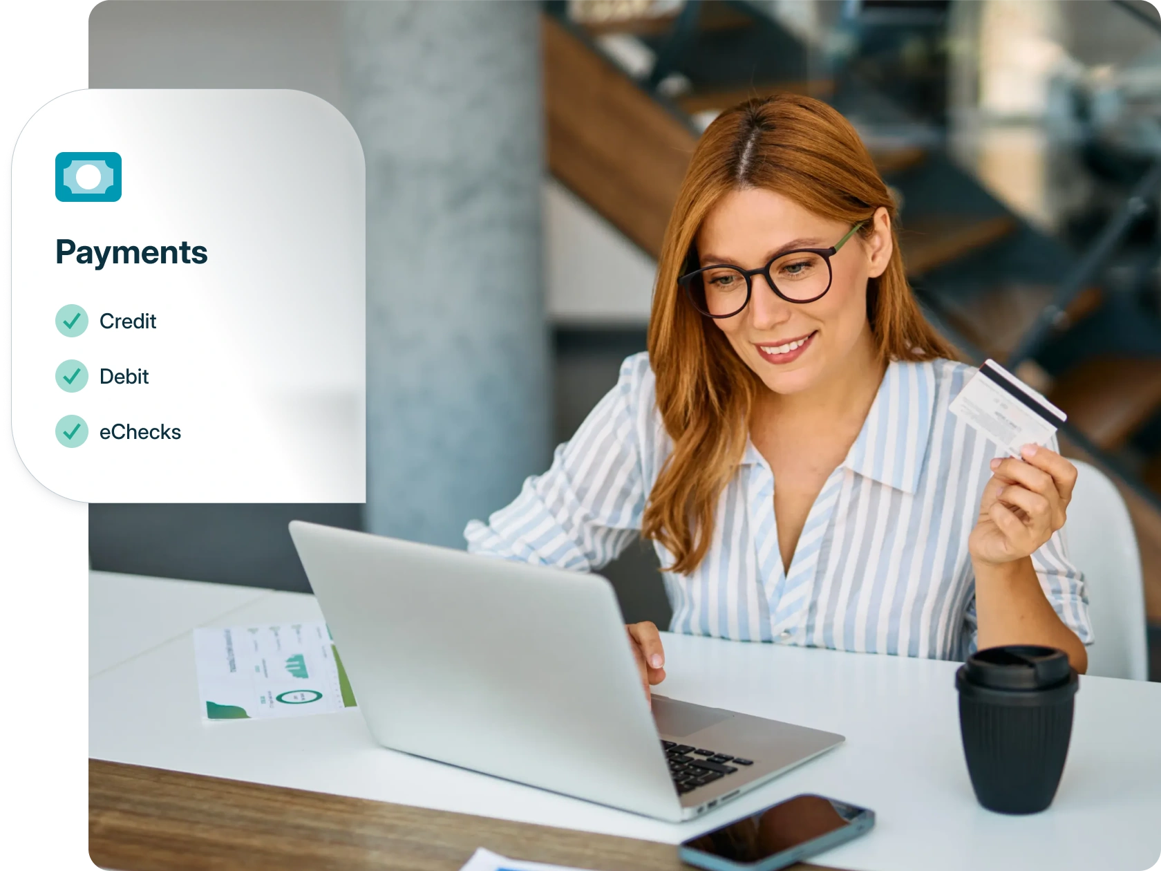 Woman entering payment details on her laptop
