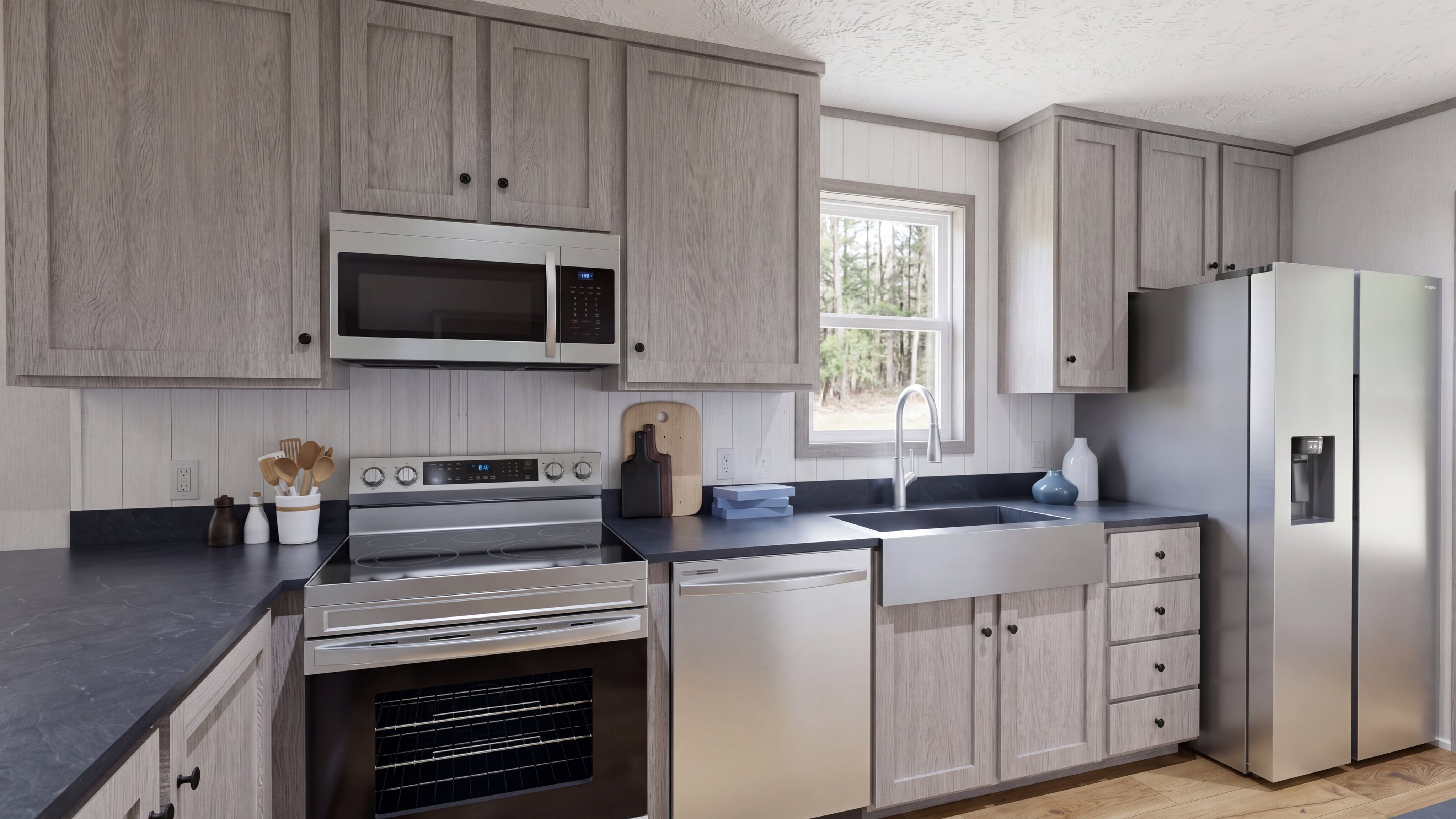 Kitchen rendering of the Anniversary 16763 home.