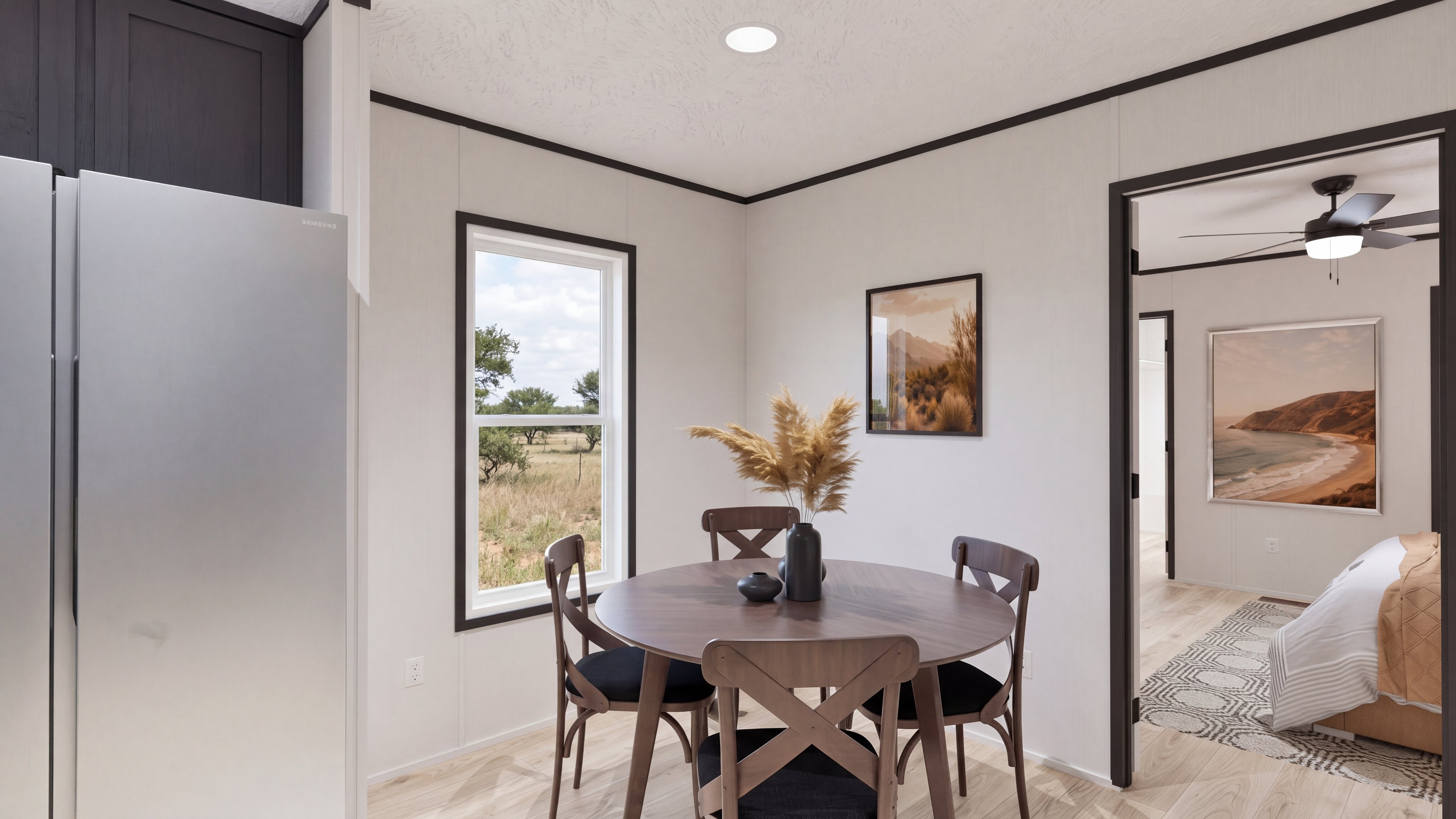 Dining area rendering of the Anniversary 16763 home.