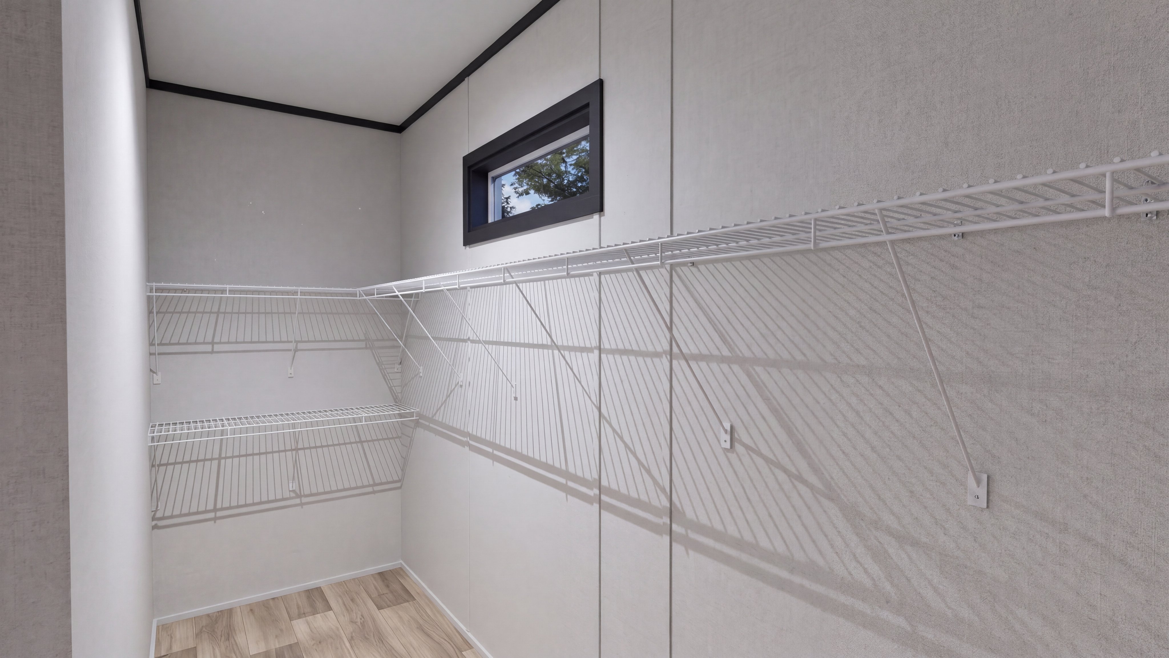 Primary bedroom closet rendering of the The Anniversary 2.1 home.