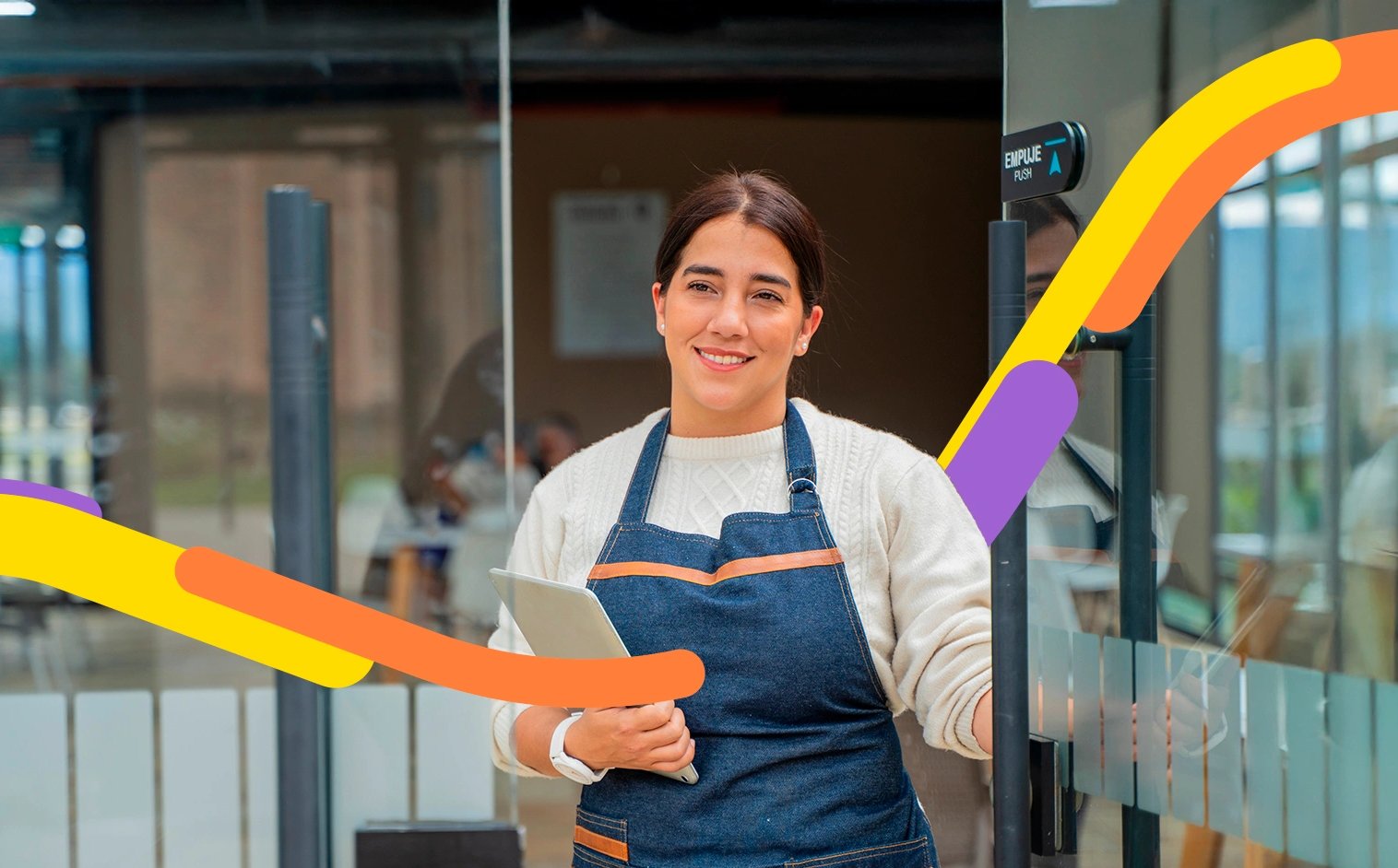 Persona en su negocio ofrece el corresponsal bancario a sus clientes para pagar o recibir plata.  