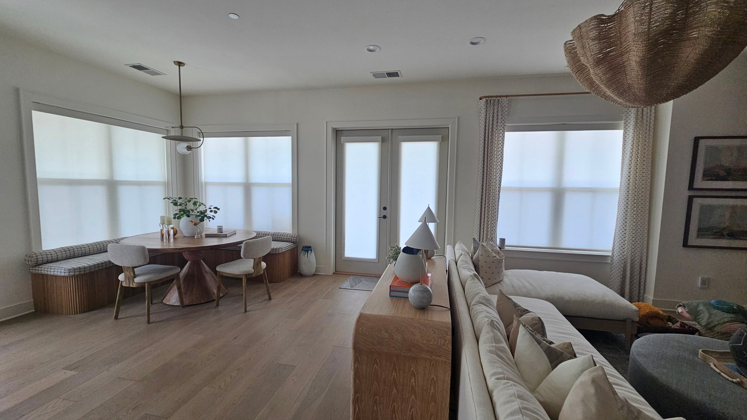 roller-shades-white-multiwindow-livingroom