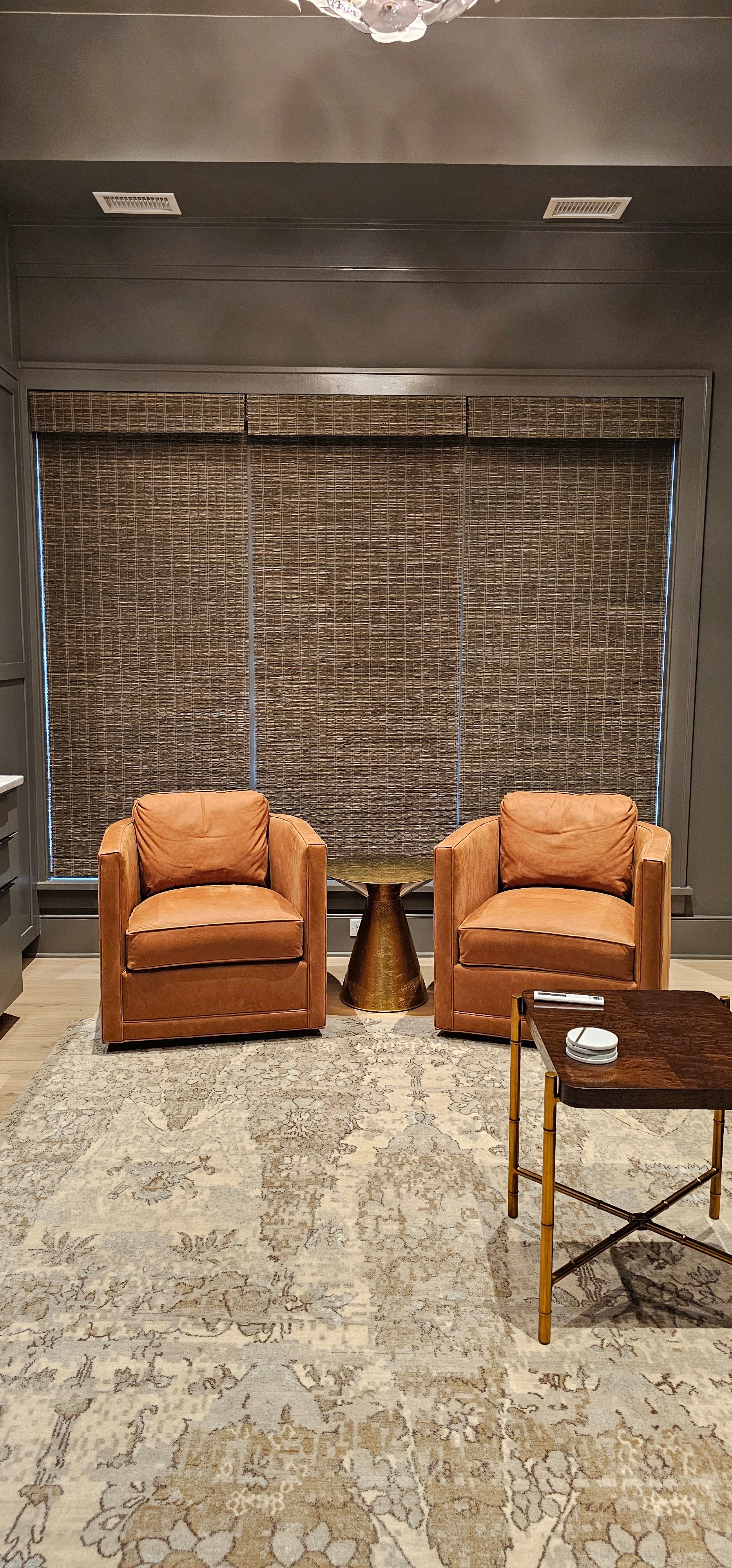 shades-woovenwood-motorized-light-brown-wine-room-living room