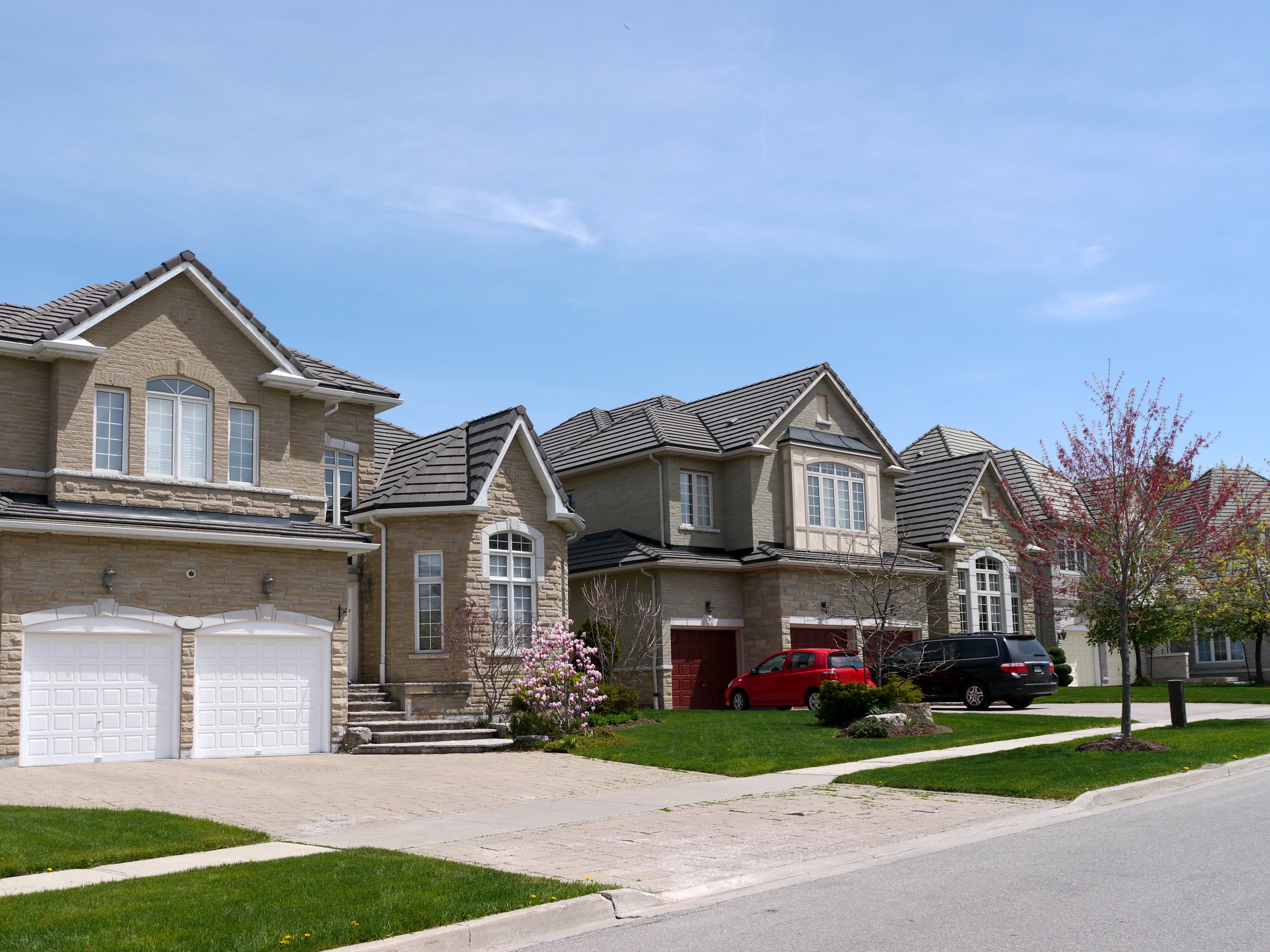 House with two cars parked in the driveway