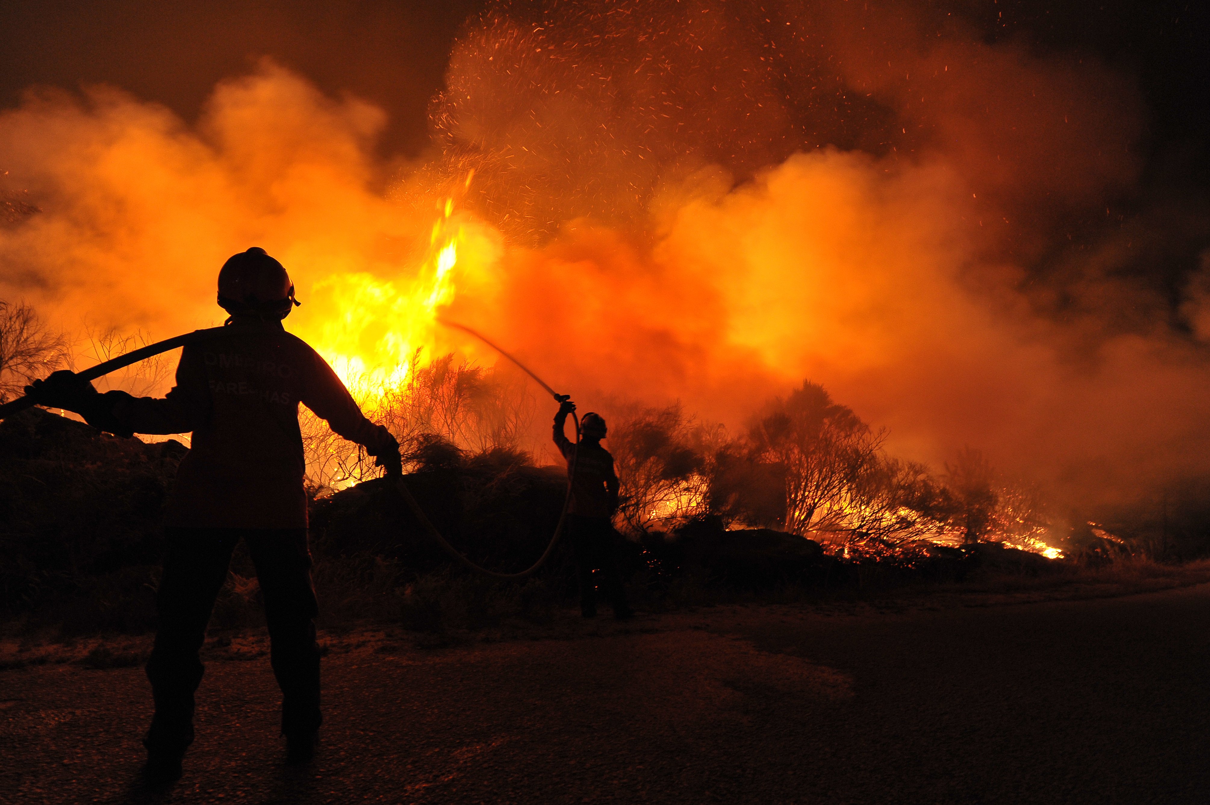 Firefighters fighting a blaze