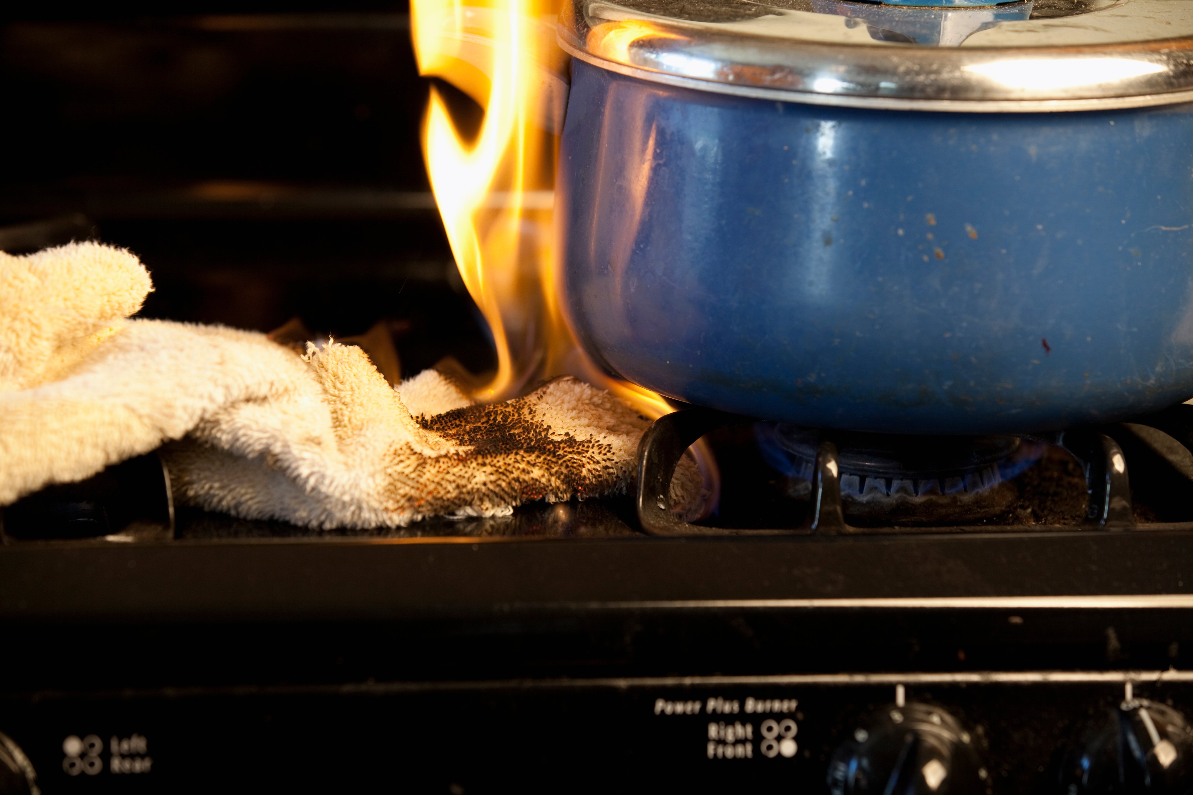 Towel accidentally catches fire on stove