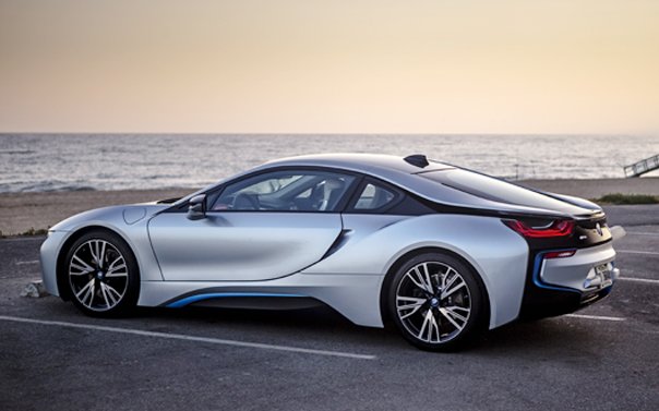 BMW i8 parked at the beach