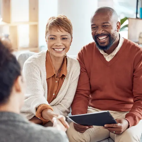 Consulting, planning and handshake with old couple and financial advisor for insurance savings.