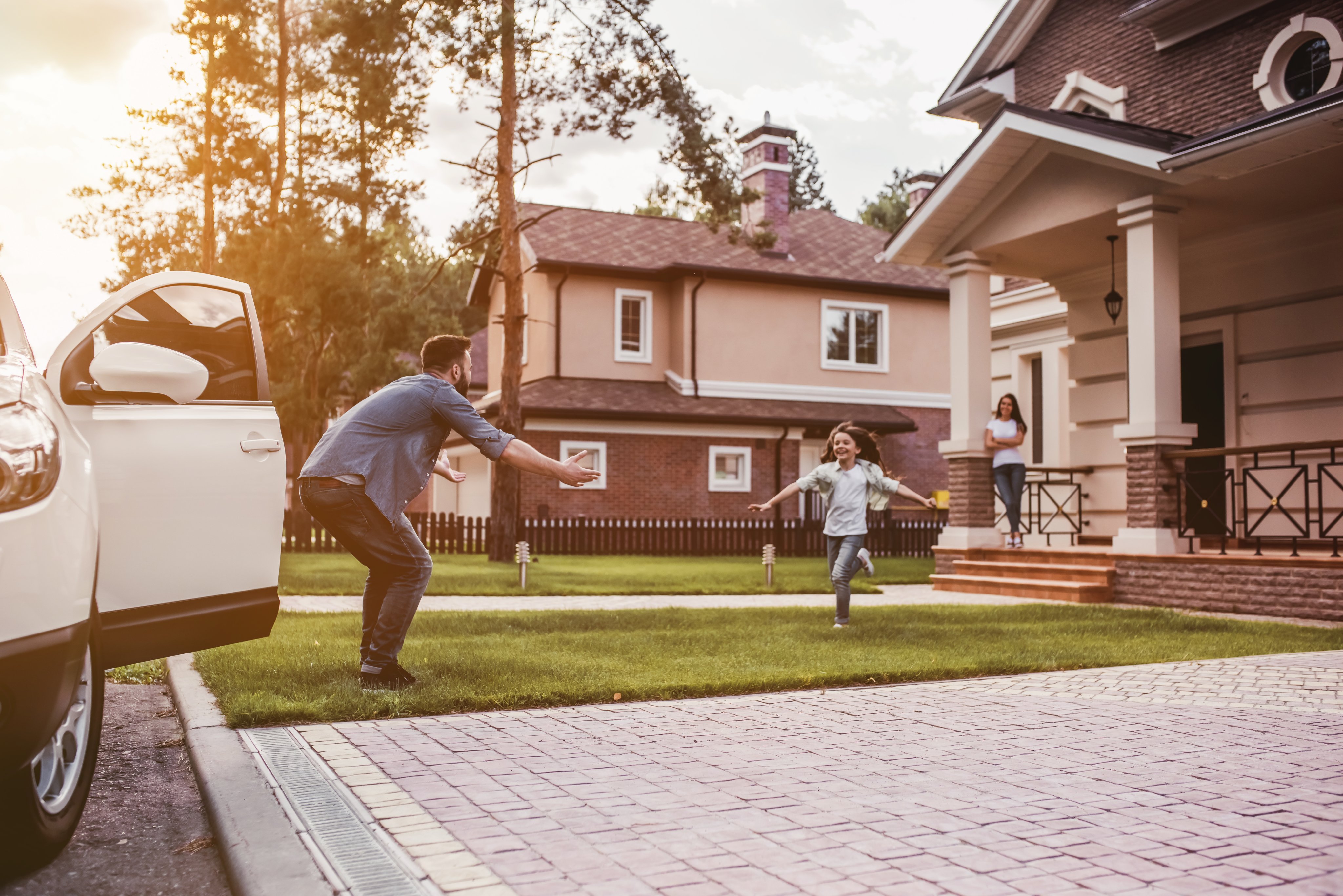 Daughter running to give dad a hug