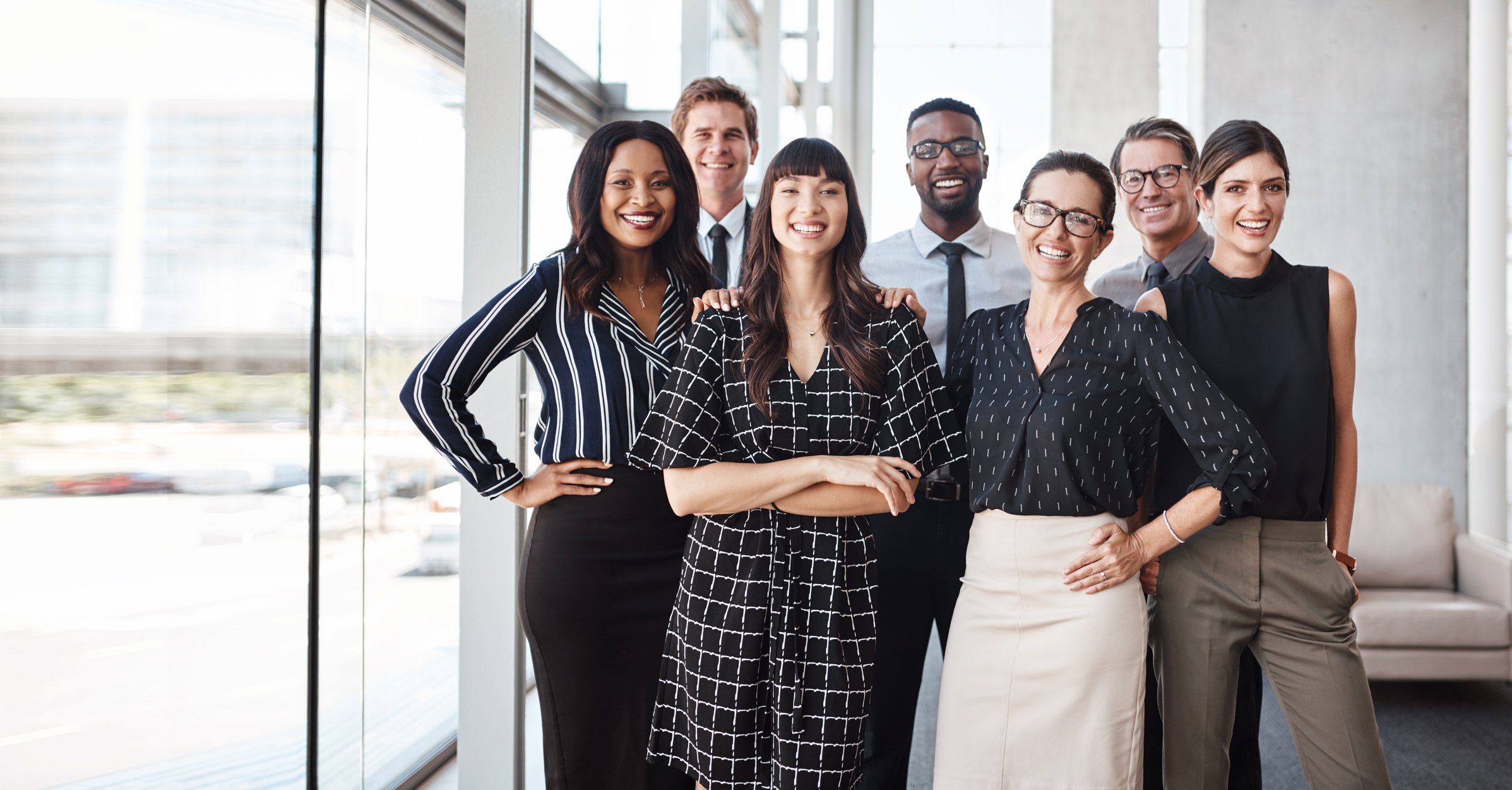 Group of smiling independent insurance agents