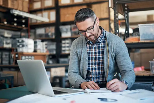 Shot of a male designer working in the workshop