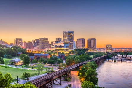 Richmond, Virginia, USA downtown skyline on the river at twilight