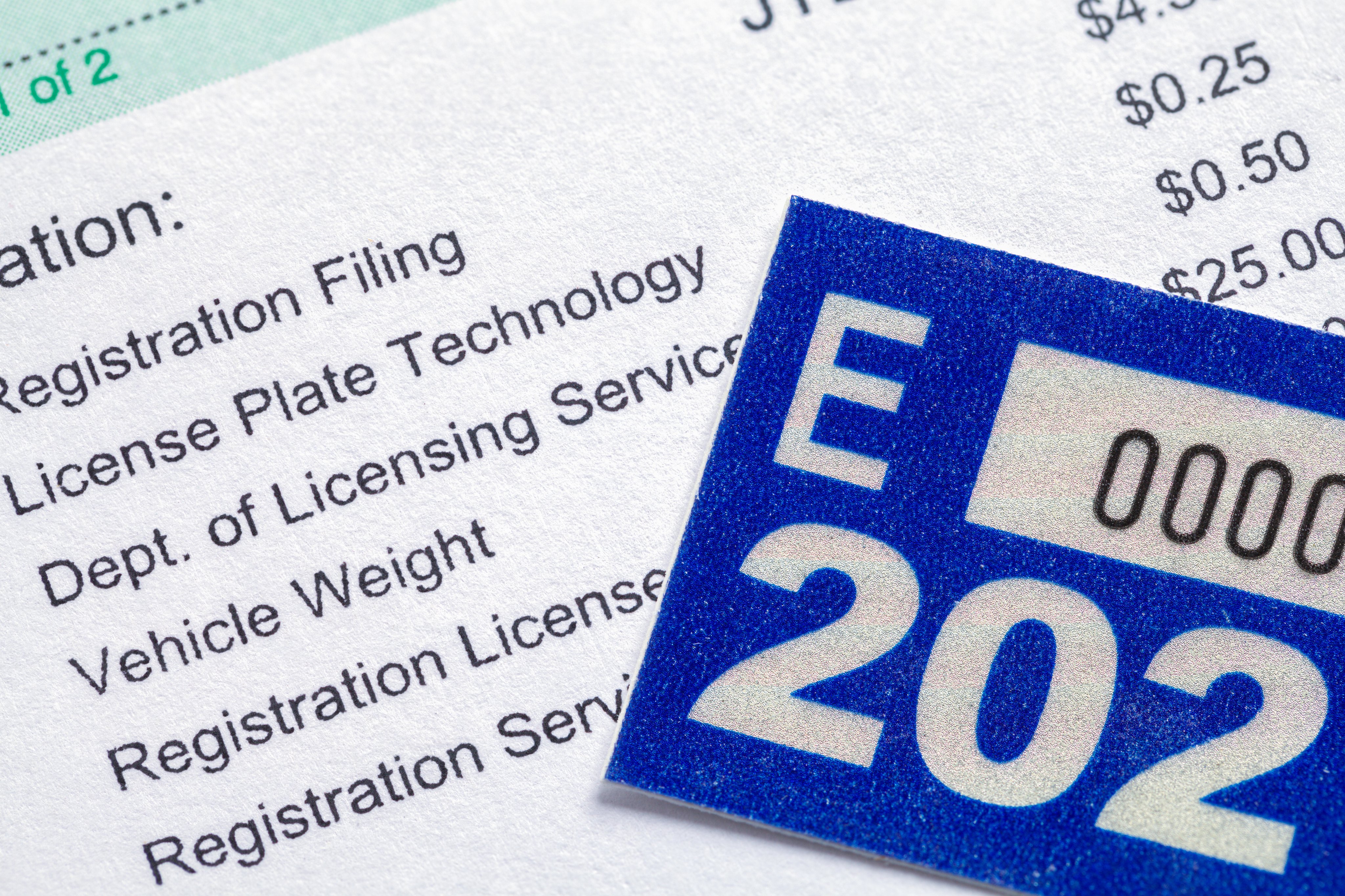 Vehicle registration paperwork with sticker tag