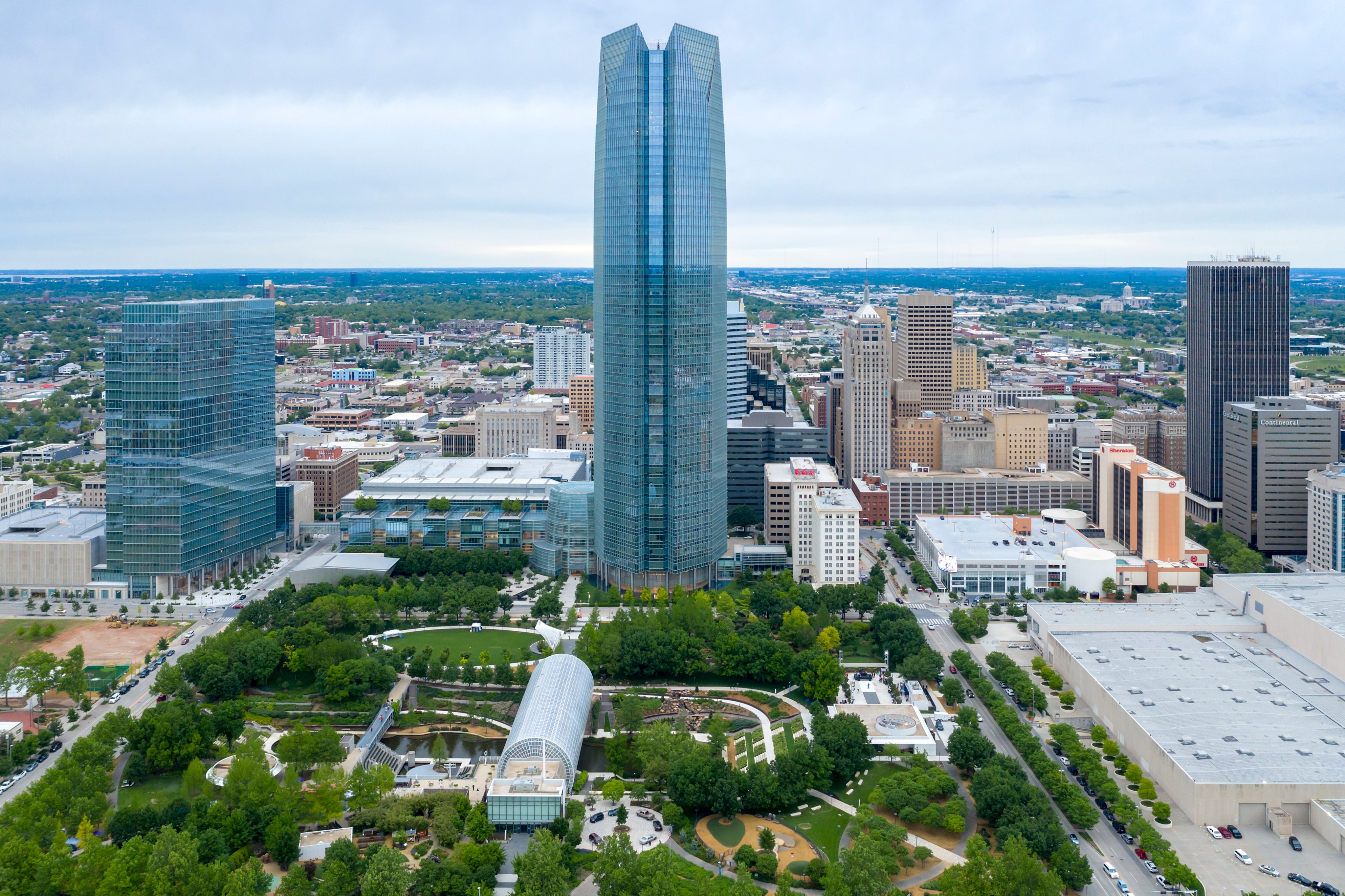 Oklahoma City, Oklahoma, USA, metropolitan area, central business district with Devon Tower, Oklahoma's tallest building, and Myriad Botanical Gardens.