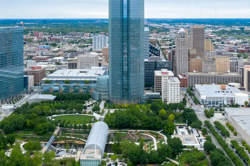 Oklahoma City, Oklahoma, USA, metropolitan area, central business district with Devon Tower, Oklahoma's tallest building, and Myriad Botanical Gardens.