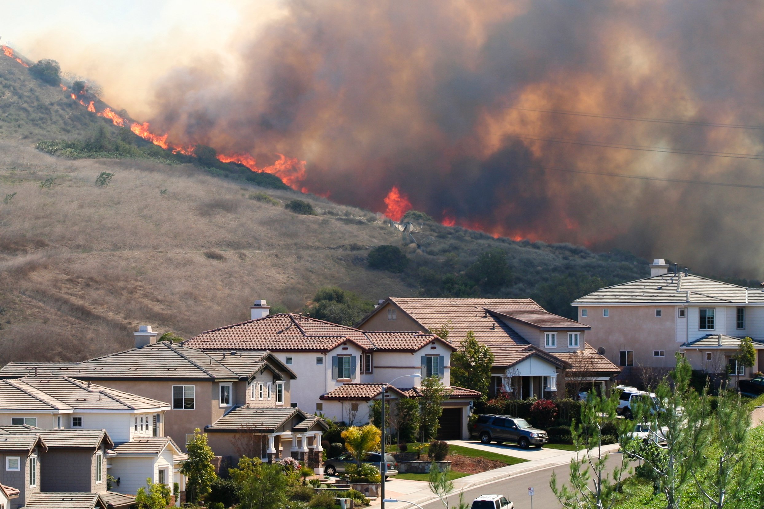 California hillside wildfire near homes