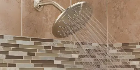 Water flowing from a low-flow shower head